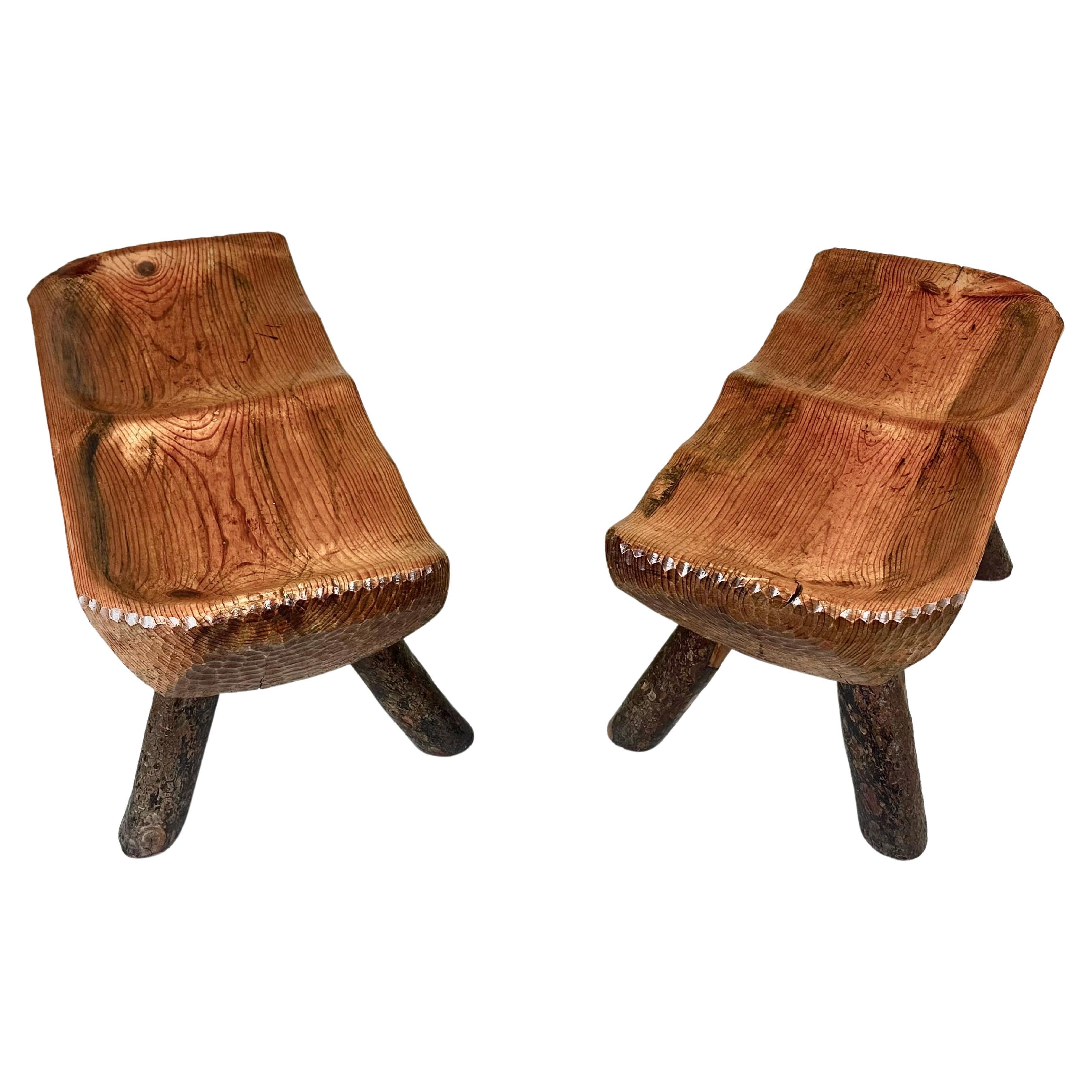 2 Rare, Hand Carved Cypress, Italian Alpine Benches circa 1950. The pieces convey the Mid-Century Modern Craftsman aesthetic with its emphasis on hand made pieces, using honest materials and reflecting sober, modern sensibilities in conjunction with