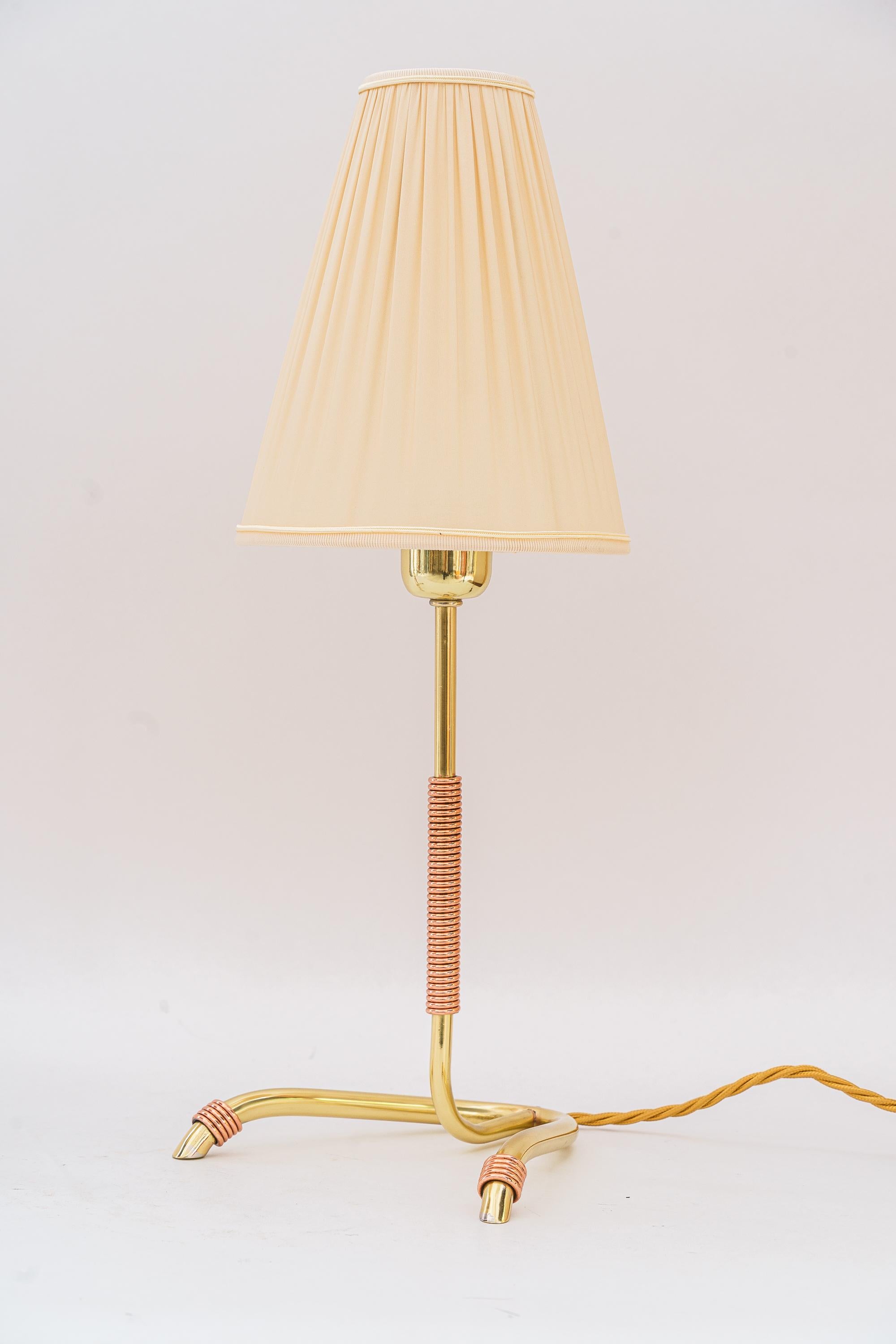 2 rare Rupert Nikoll table lamp vienna around 1950s
Brass polished and stove enameled
fabric shade is replaced ( new )
