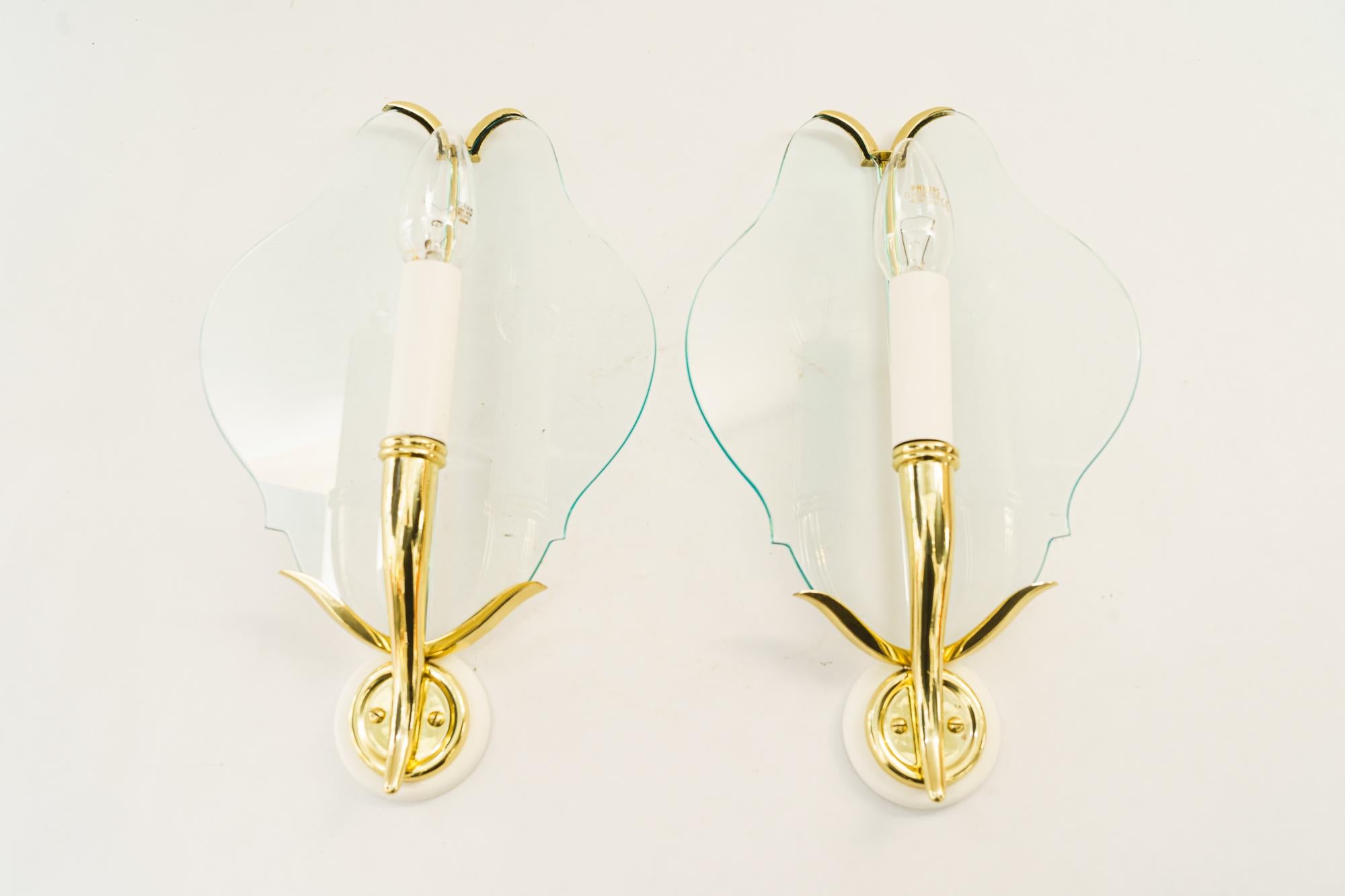 2 Rare wall lamps with original glass shades vienna around 1950s
Brass polished and stove enameled

