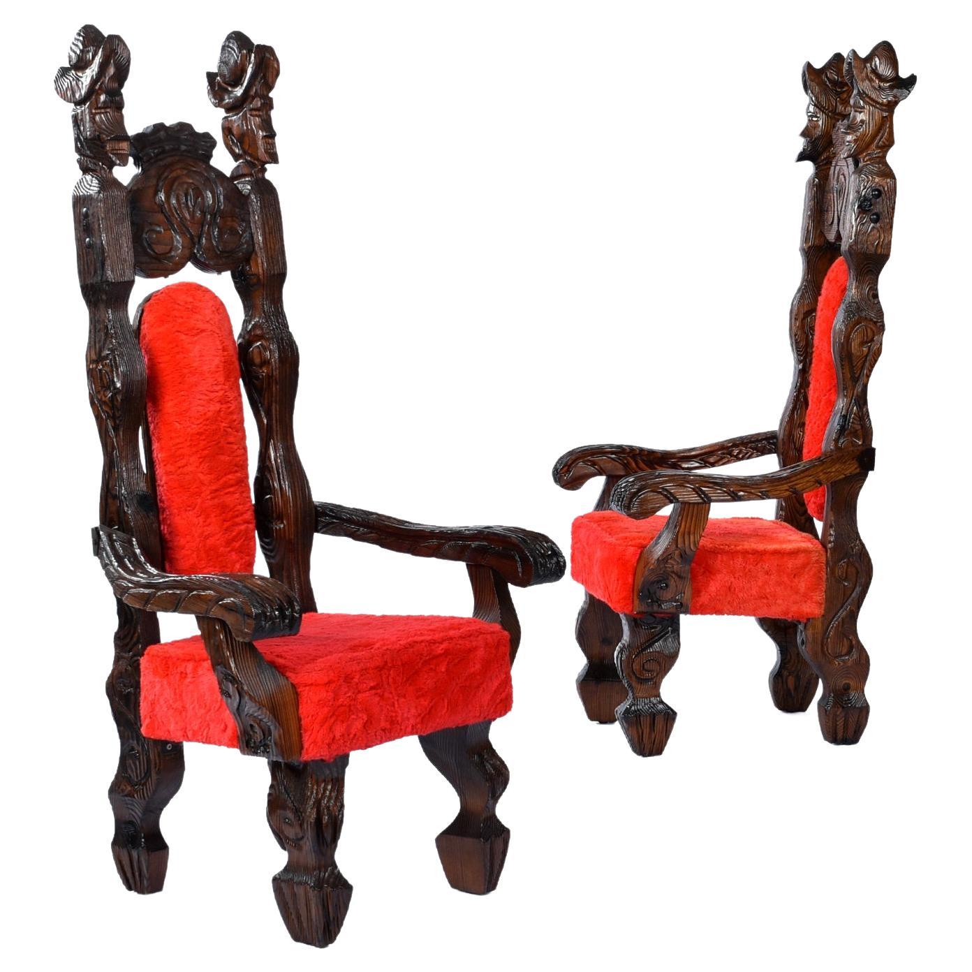 Pair of restored Witco Conquistador tiki throne chairs in original red fur. These chairs are absolutely wild in the best kind of way. The original red fur fabric has a thick pile. This bright red upholstery adds drama to the high-back, iron cladded,