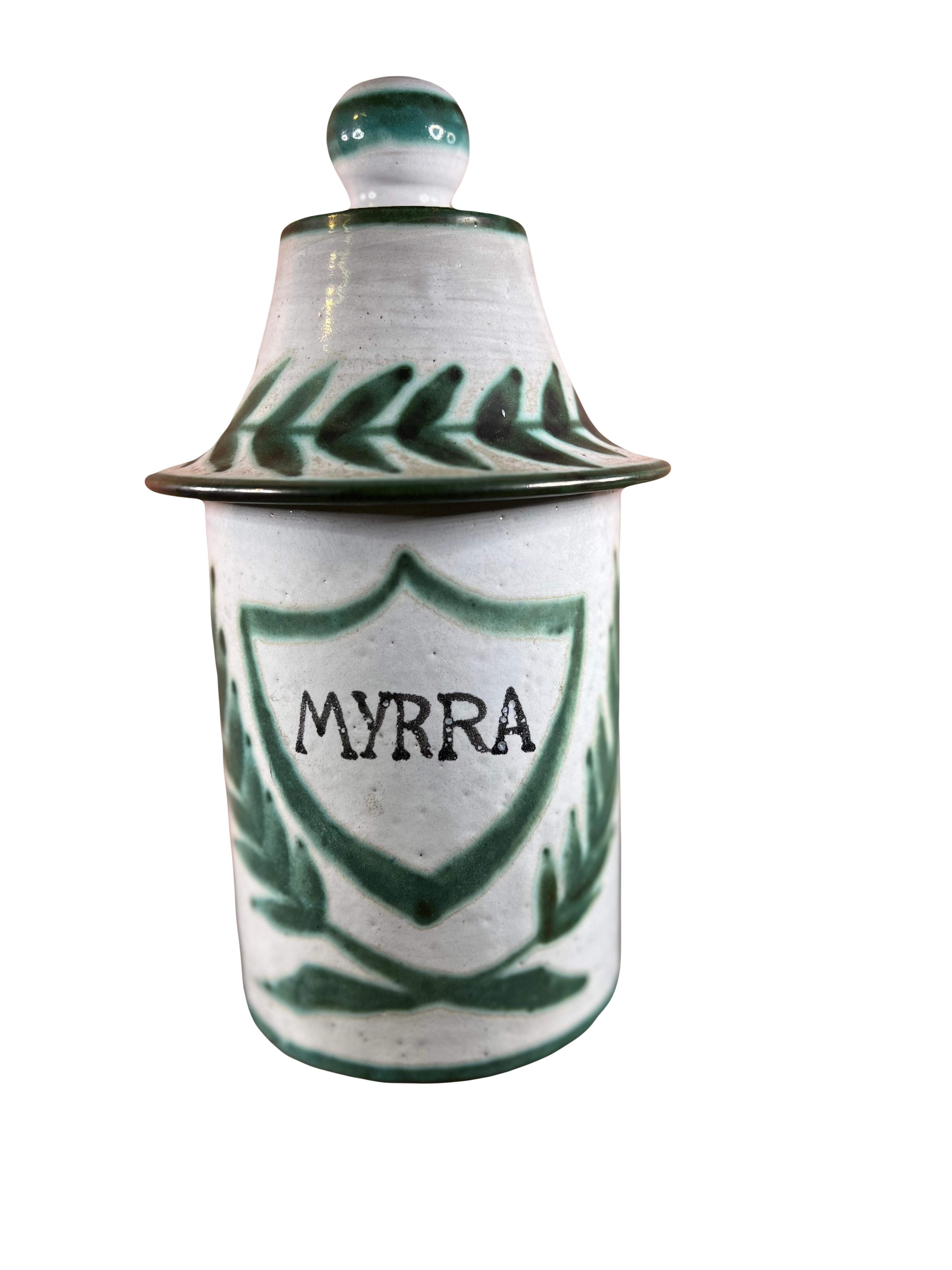 Set of two mid-century pharmacy jars from the 1950s, crafted by Robert Picault. Each jar comes with its own lid. The jars bear a Latin inscription: Myrra and Opiat.
They are in excellent condition and will make a charming addition to your interior,