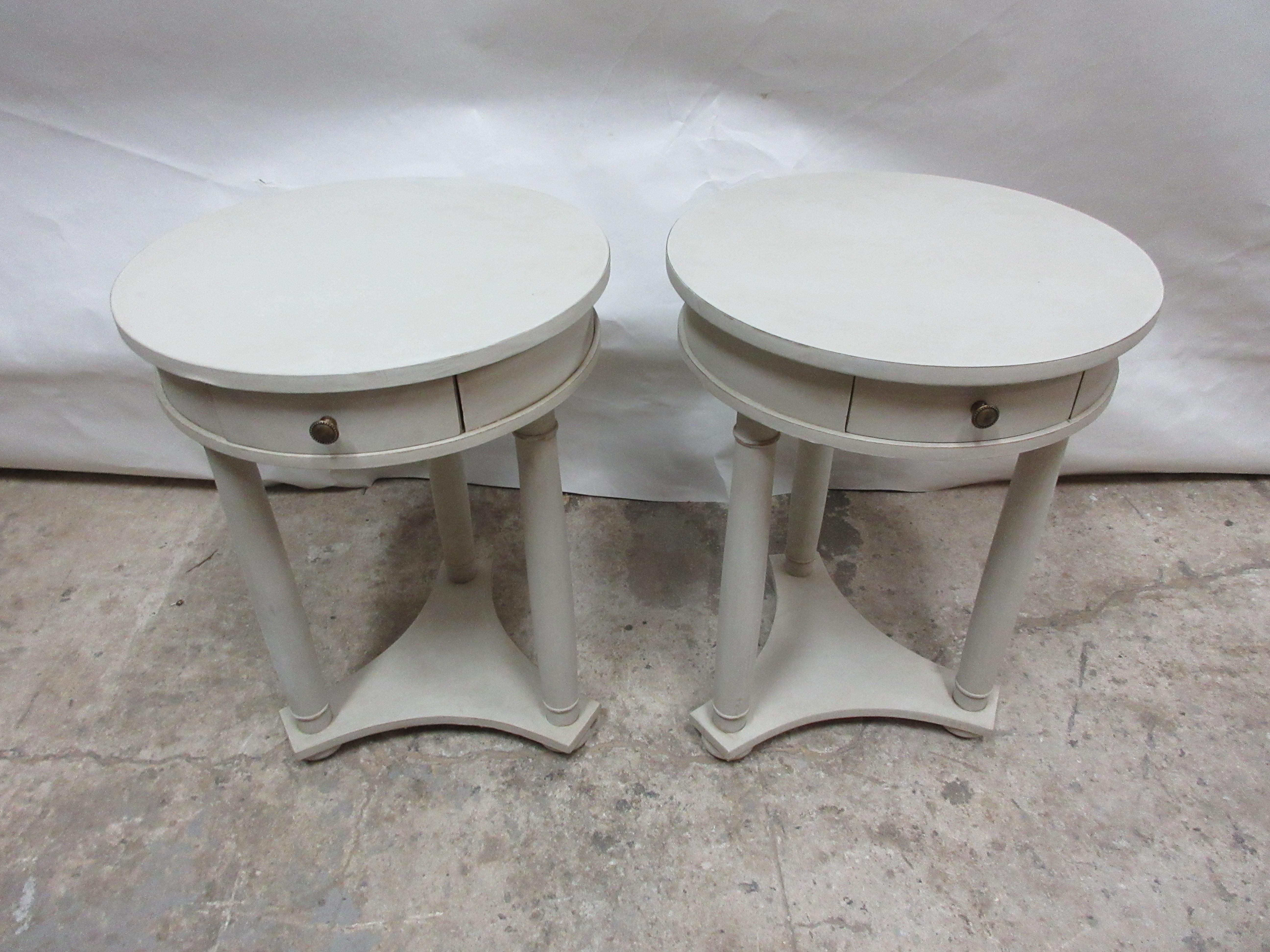 This is a set of 2 round tables side tables. They have been restored and repainted with milk paints 