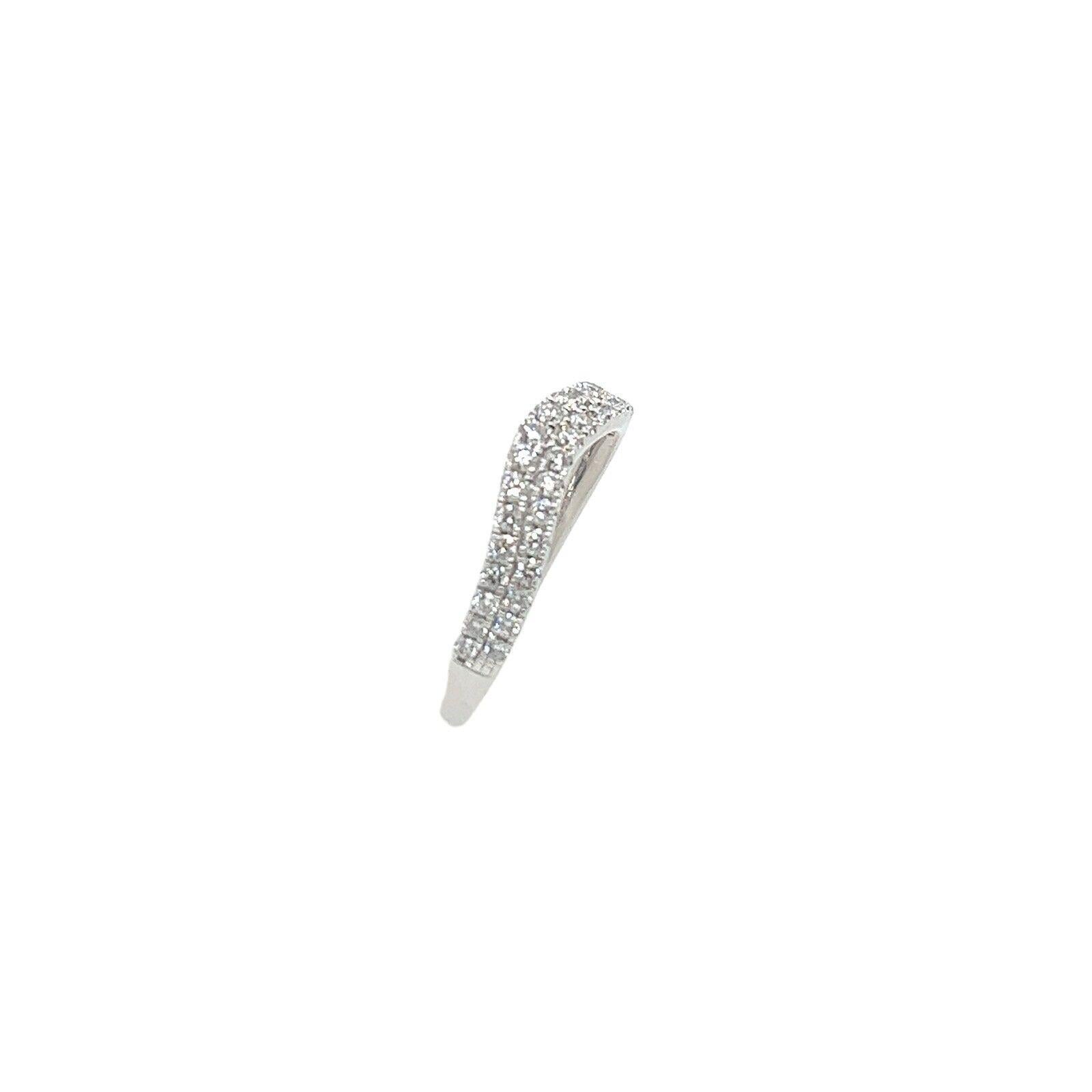 This Diamond half eternity band is set with 0.34ct round brilliant cut Diamonds. This ring is elegant and beautiful for a wedding or anniversary ring, set in 9ct White Gold.

Additional Information: 
Total Diamond Weight: 0.34ct 
Diamond Colour:
