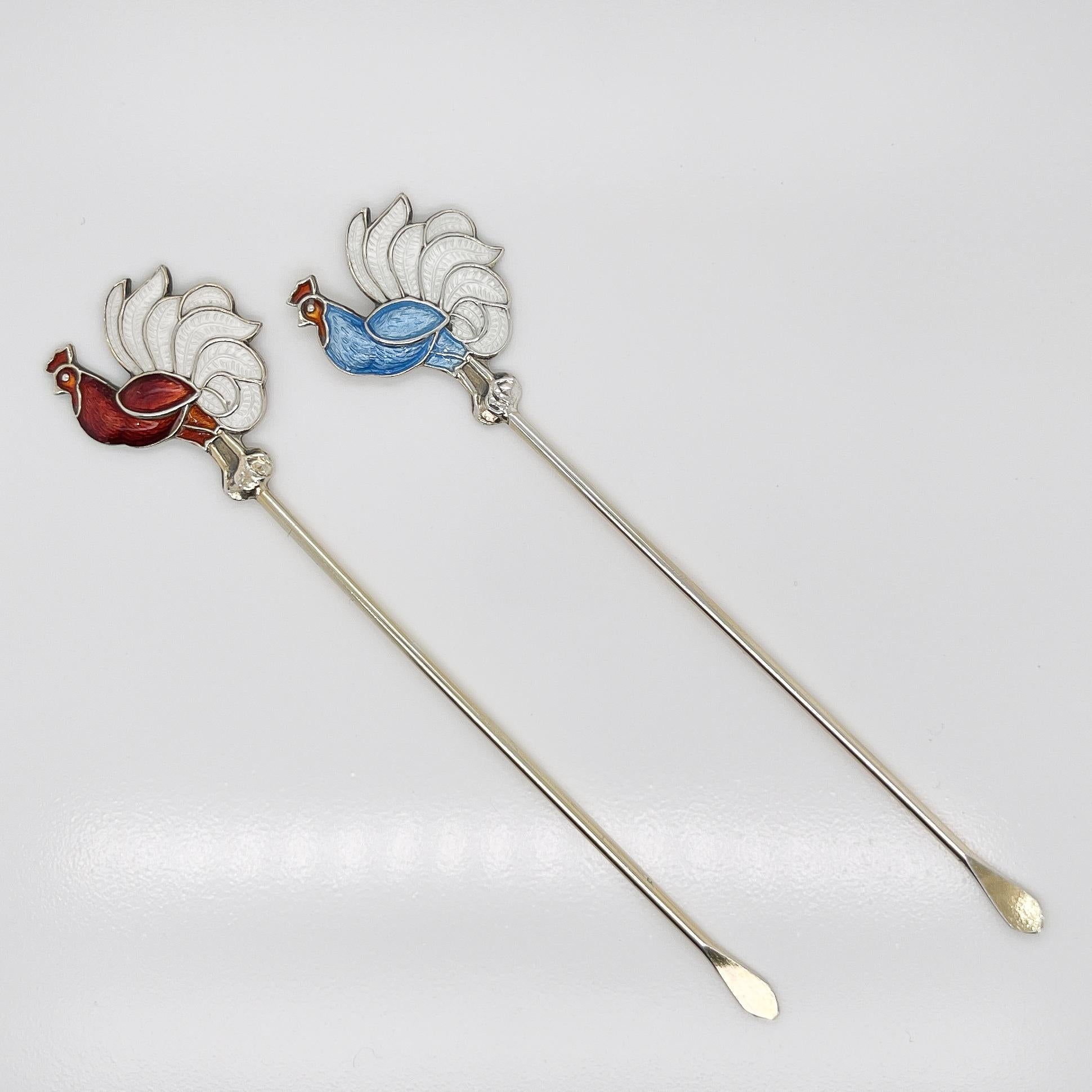 A fine pair of Norwegian Mid-century Modern cocktail picks.

By Bernard Meldahl.

In sterling silver with enamel and traces of gilding. 

Simply a great pair of cocktail picks!

Date:
Mid-20th Century

Overall Condition:
They are in overall good,