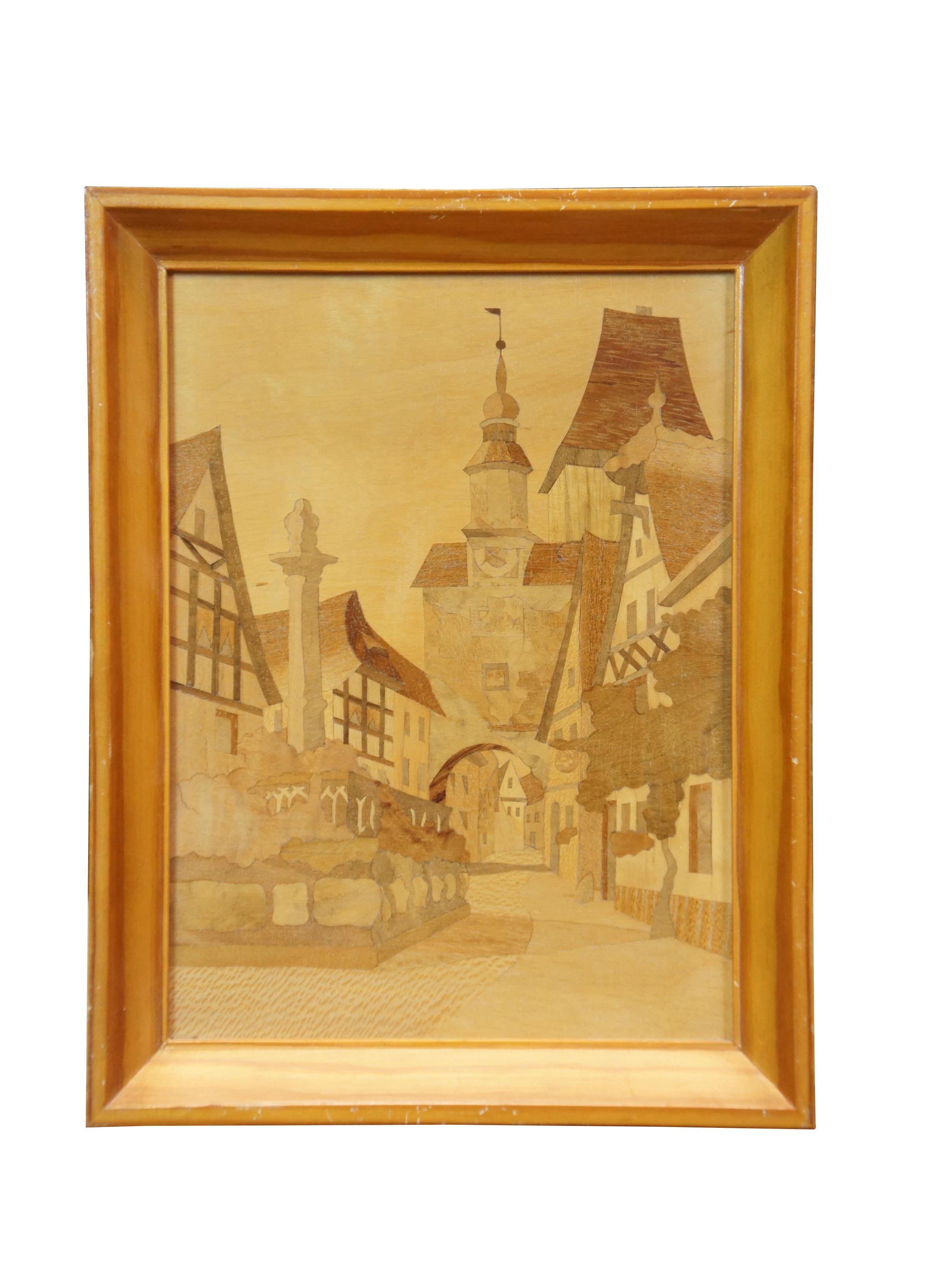 Pair of mid 20th century wooden inlay / marquetry cityscapes by Schild Intarsia, depicting a pair of picturesque German / European city streets. Beveled wood frame.

Dimensions:
8.25