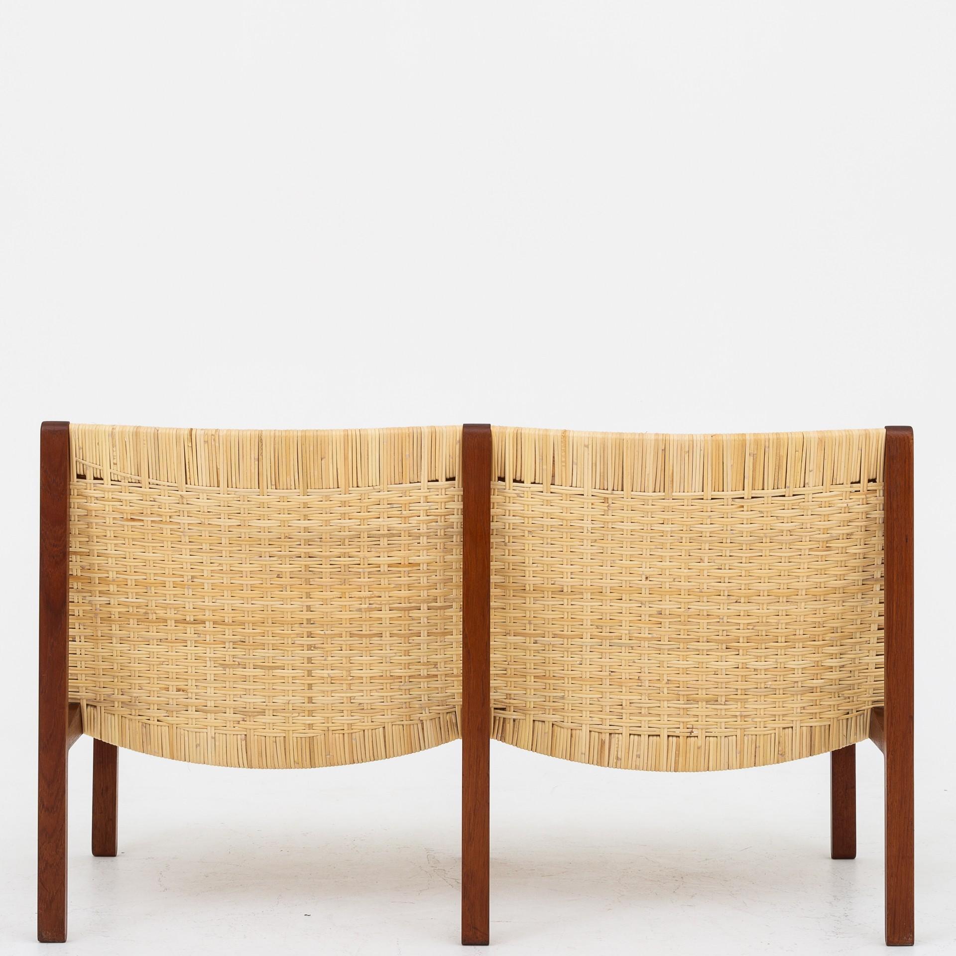 2-seat bench in teak with new woven cane. Maker Willy Beck.
