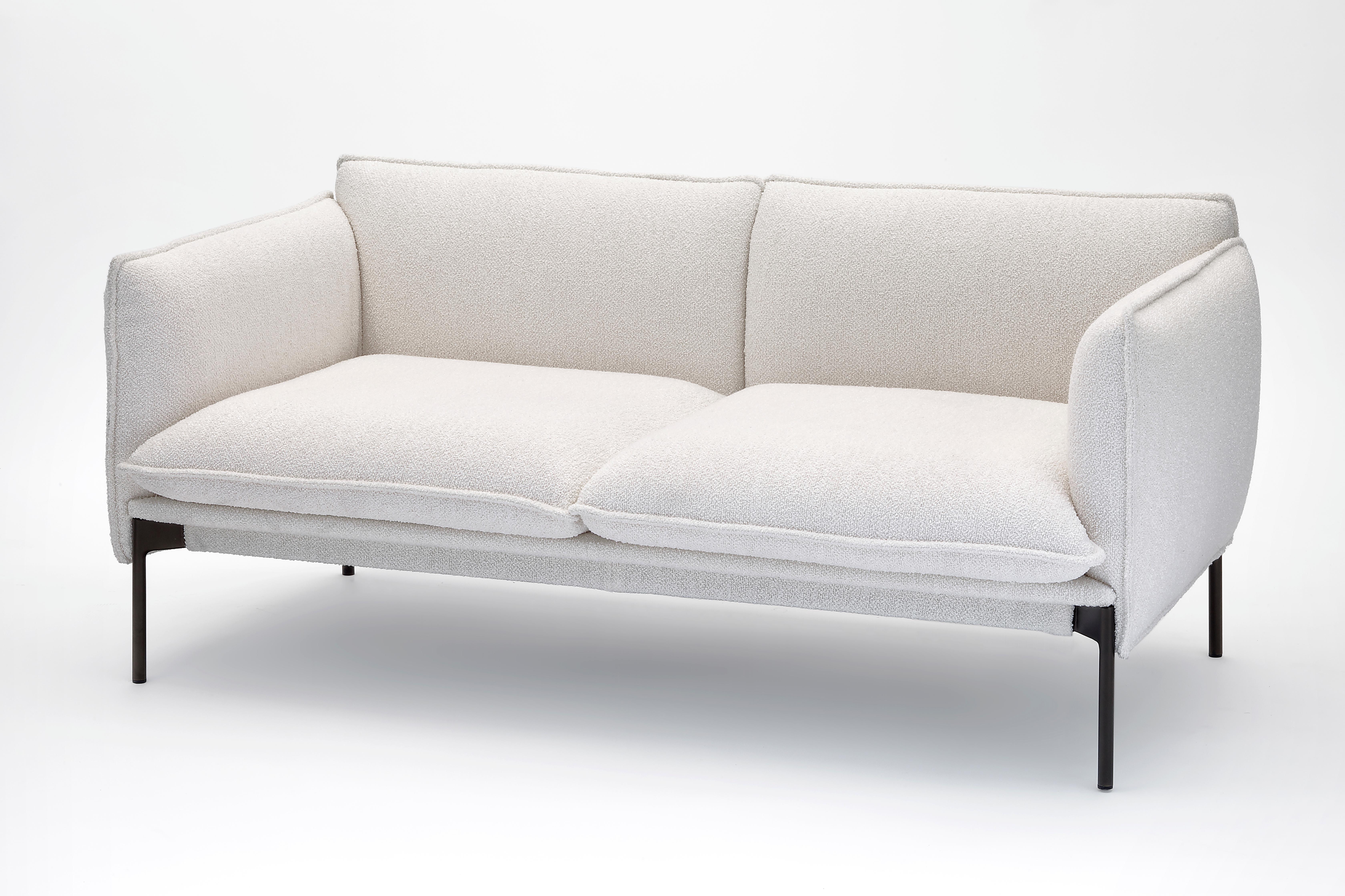 2 seat palm springs sofa by Anderssen & Voll
Materials: Polyurethane foam of different densities, covered with fabric or leather. Base in bronze lacquered metal.
Technique: Lacquered metal, upholstered in fabric. 
Dimensions: D 83 x W 160 x H 69