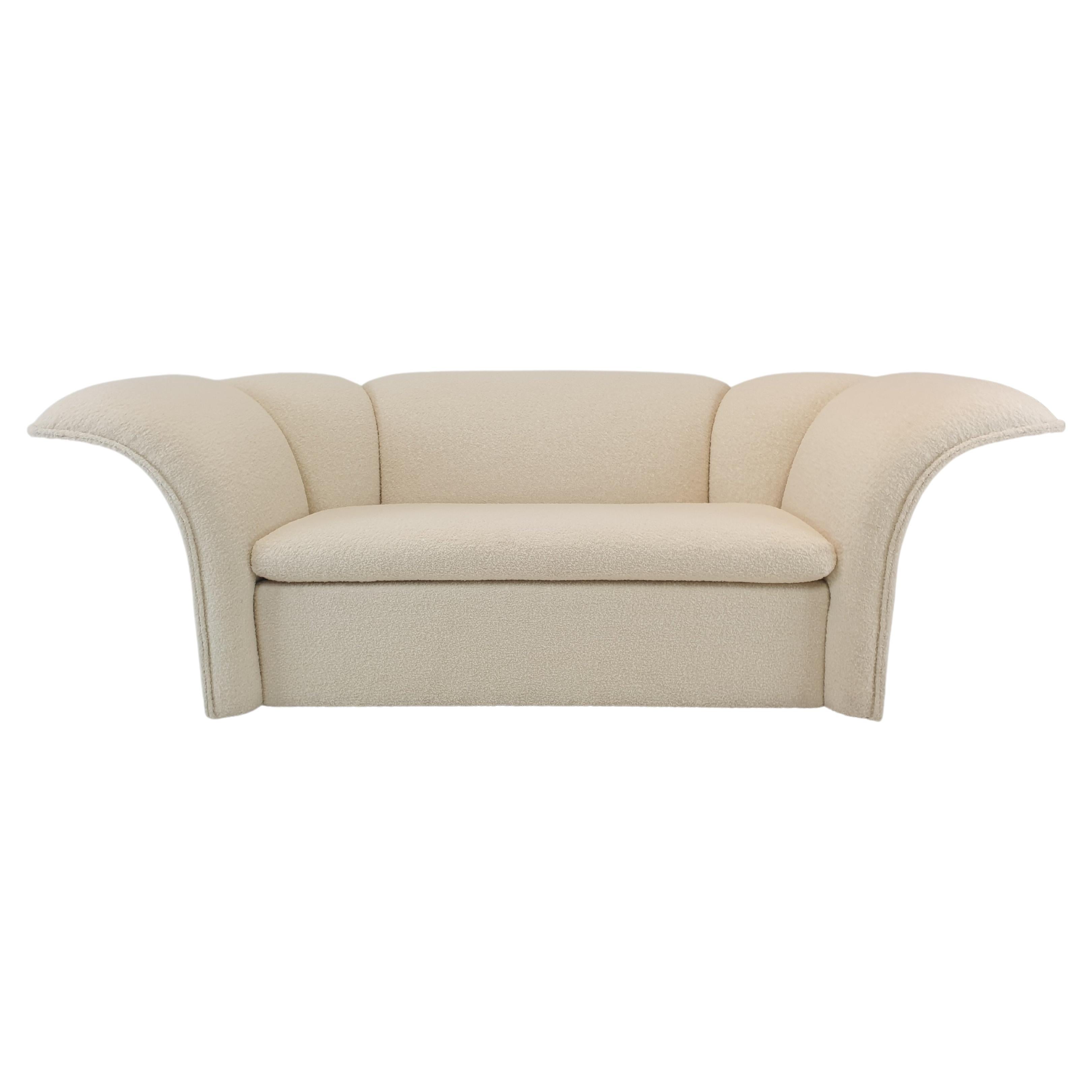 What is a curved back sofa?
