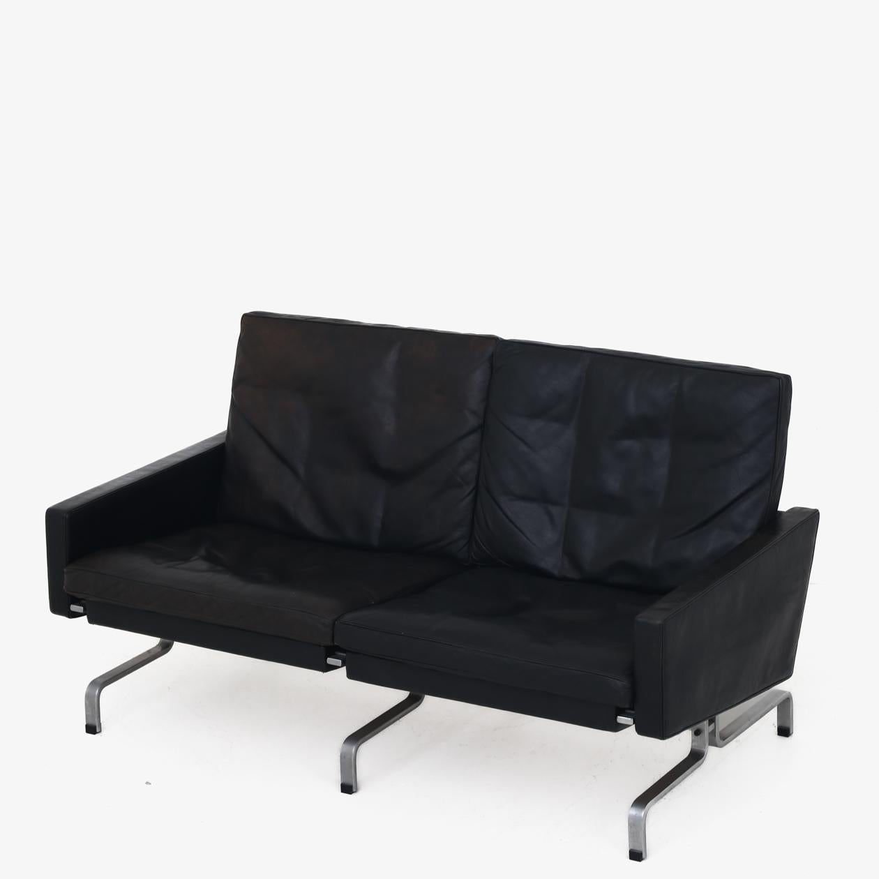 PK 31/2 - 2 seater sofa in black patinated leather with chromed steel frame. Poul Kjærholm / E. Kold Christensen.
