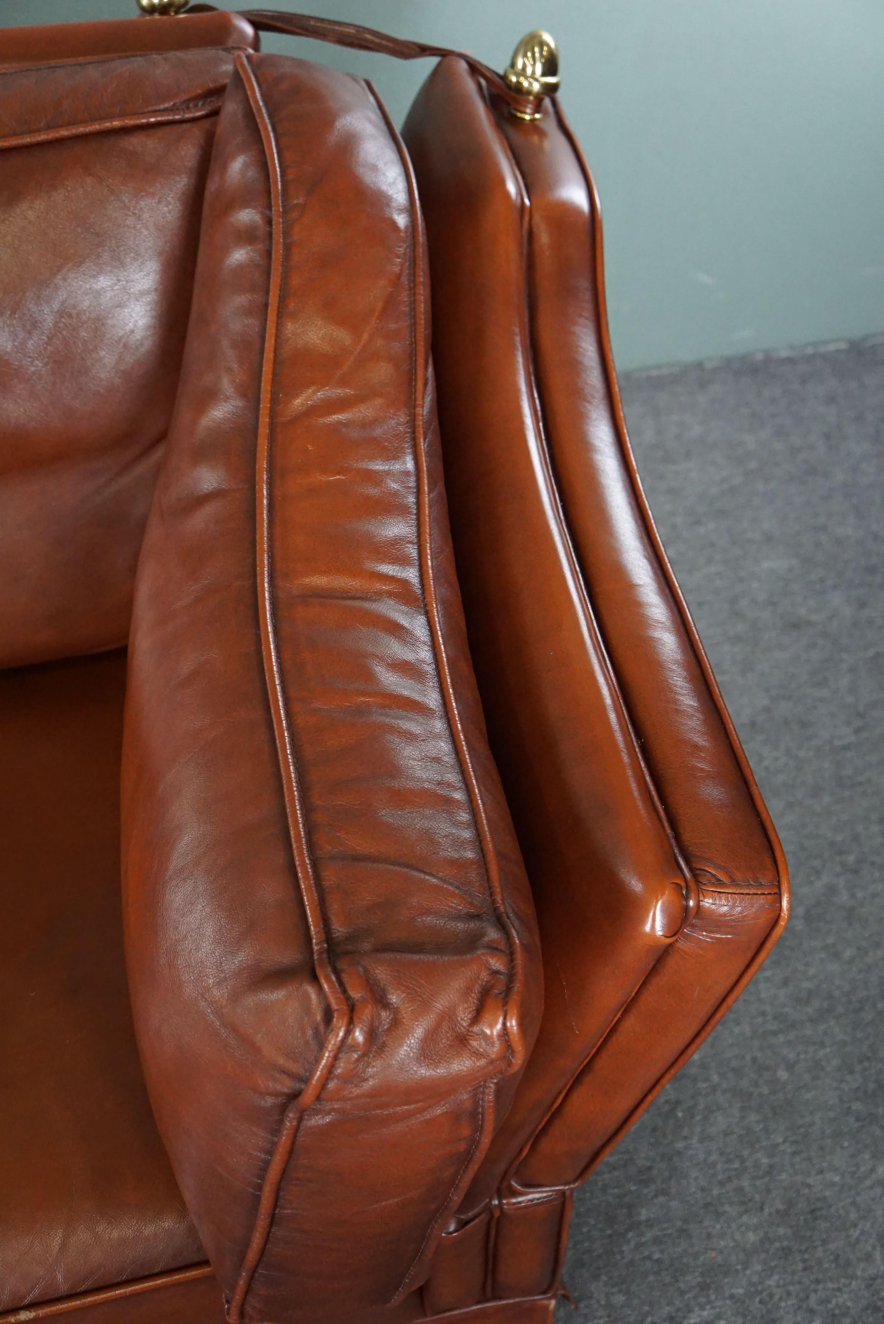 2-seater castle bench made of high-quality cognac-colored cowhide leather. For Sale 3