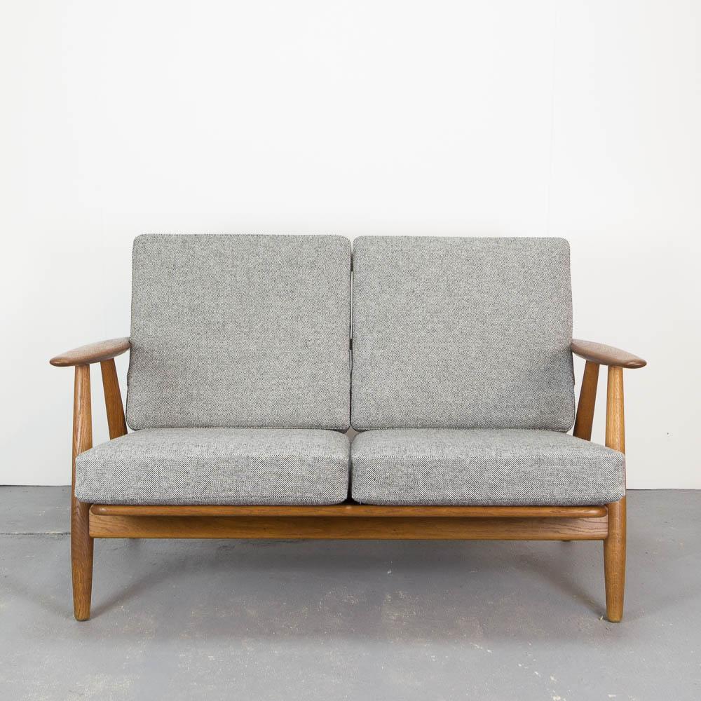 The iconic GE240/2 Cigar Sofa by Hans Wegner for GETAMA, Denmark, 1960s. Fully restored with solid oak frame and newly upholstered in Hallingdal 65 fabric.