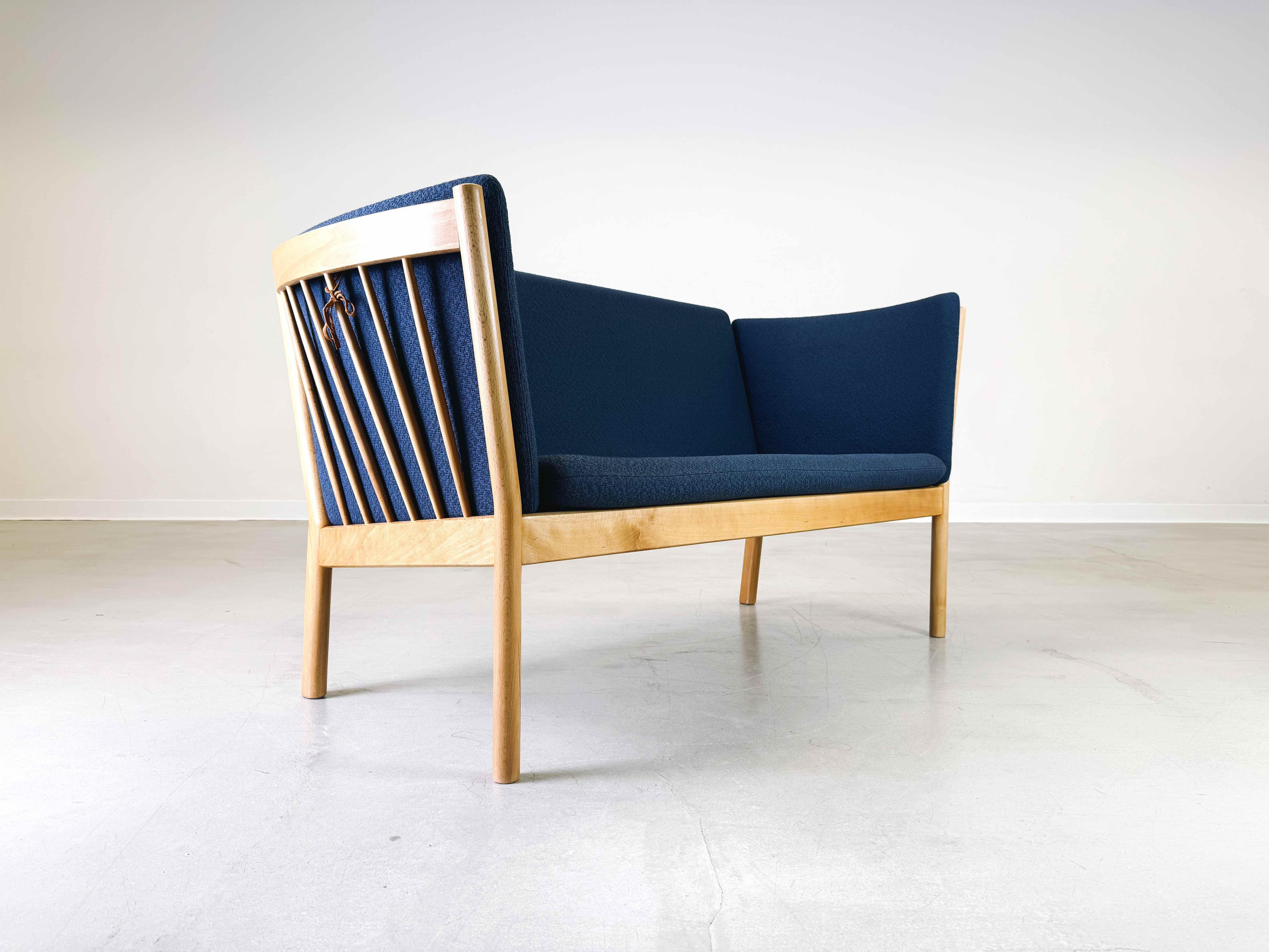 We are offering a beautiful 2-seater and true design classic by Erik Ole Jørgensen for sale. The sofa is approx. 15 years old and is still in production today. The fabric is only slightly faded over the years and the frame is in almost new condition