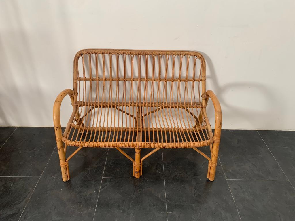 Two-seater bamboo sofa, 1970s.
Packaging with bubble wrap and cardboard boxes is included. If the wooden packaging is needed (fumigated crates or boxes) for US and International Shipping, it's required a separate cost (will be quoted separately).
