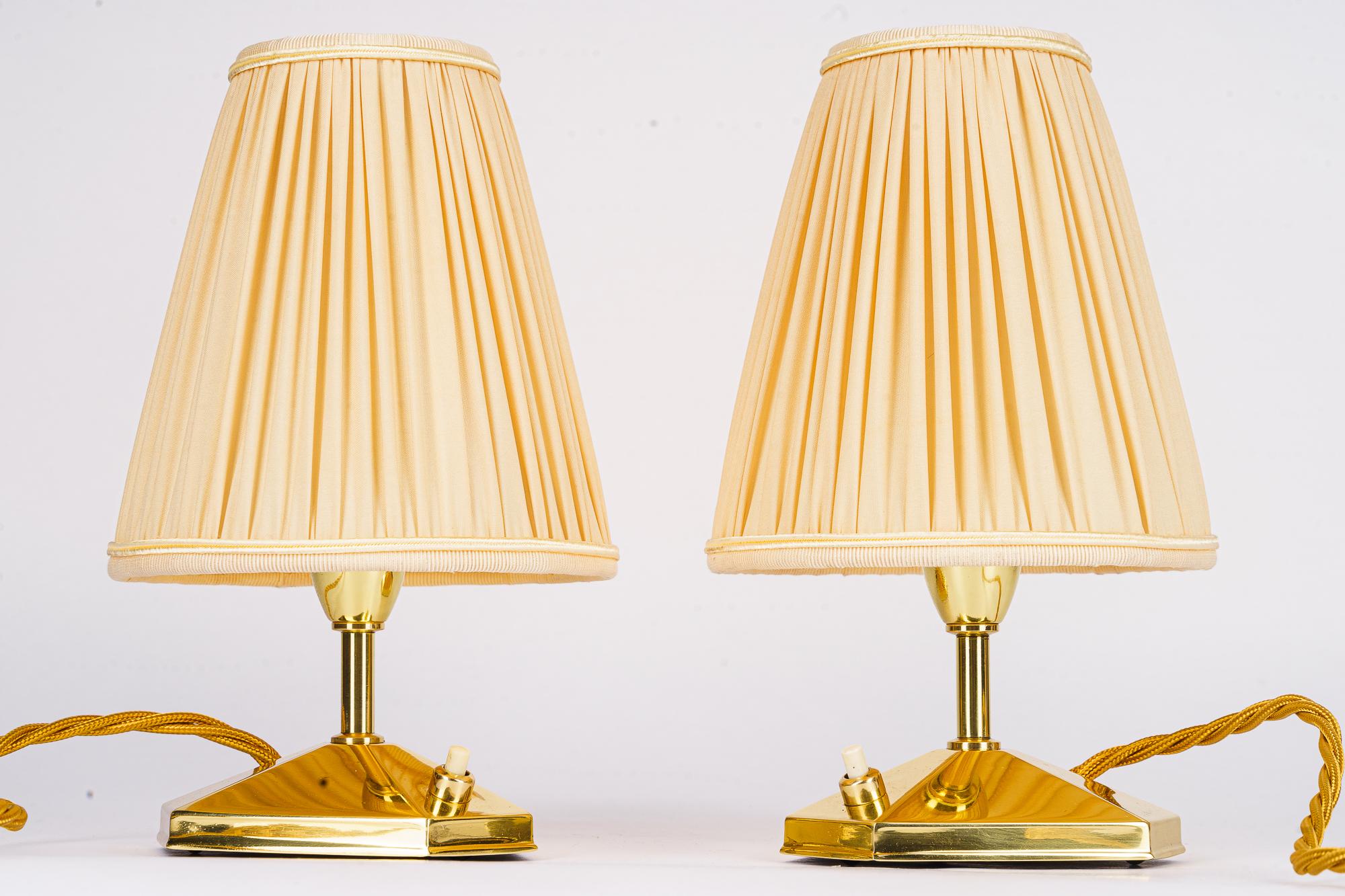 2 small brass table lamps with fabric shades vienna around 1960s
Brass polished and stove enameled
The fabric shade is replaced ( new )