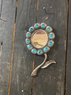 2 small mirrors in cast aluminum and blue stone circa 1970