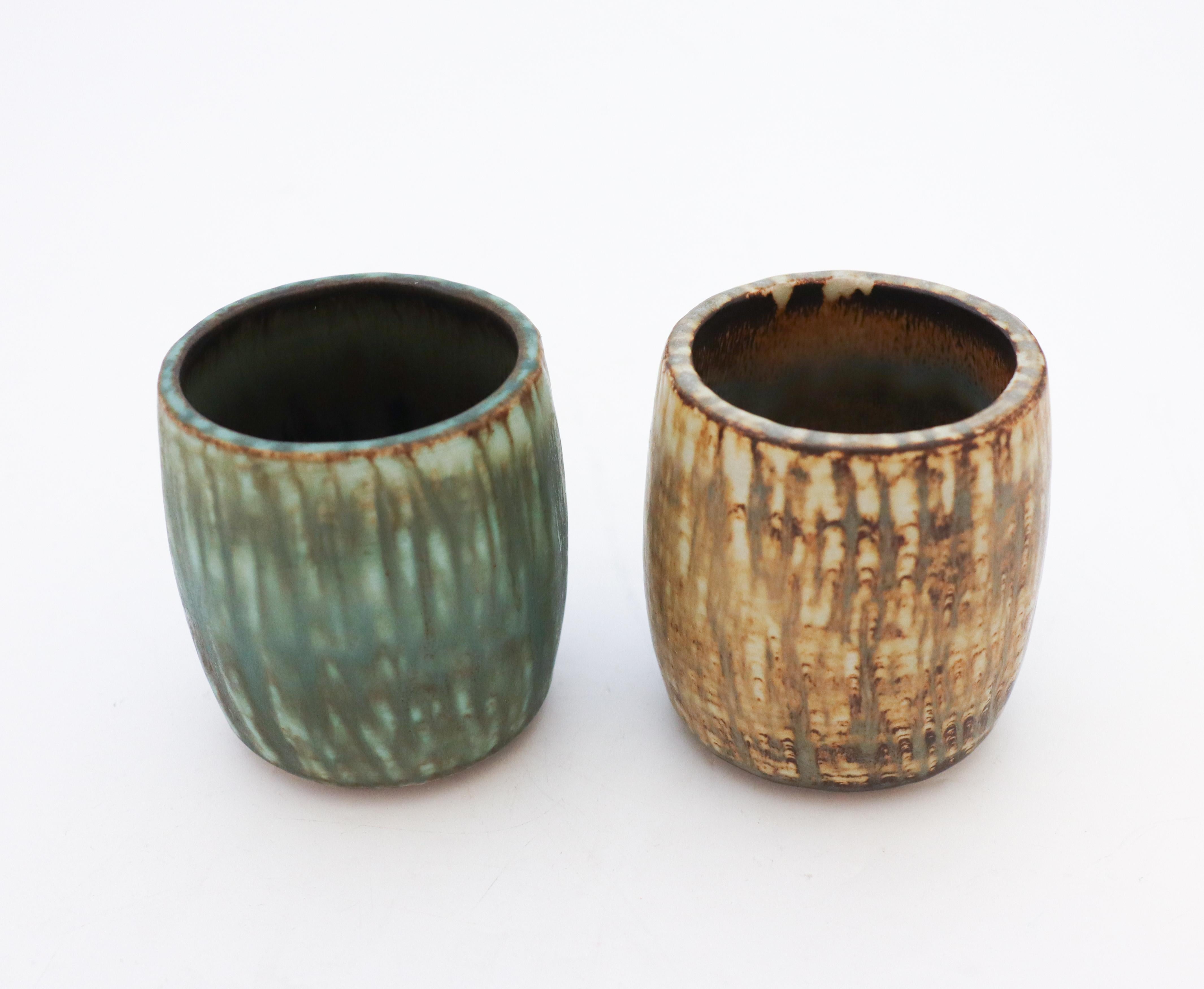 A pair of Rubus vases in green and brown designed by Gunnar Nylund at Rörstrand, they are 8.5 cm (3.4) high and 7.5 cm (3
