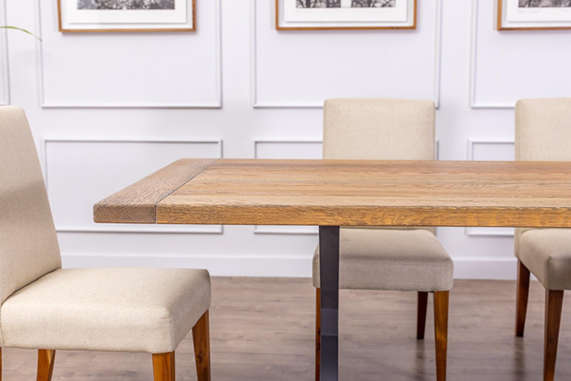 This handcrafted solid oak dining table is a masterpiece of timeless beauty and exceptional craftsmanship. Made from solid North American oak, this dining table showcases the natural elegance and durability of this exquisite hardwood.

Each table is