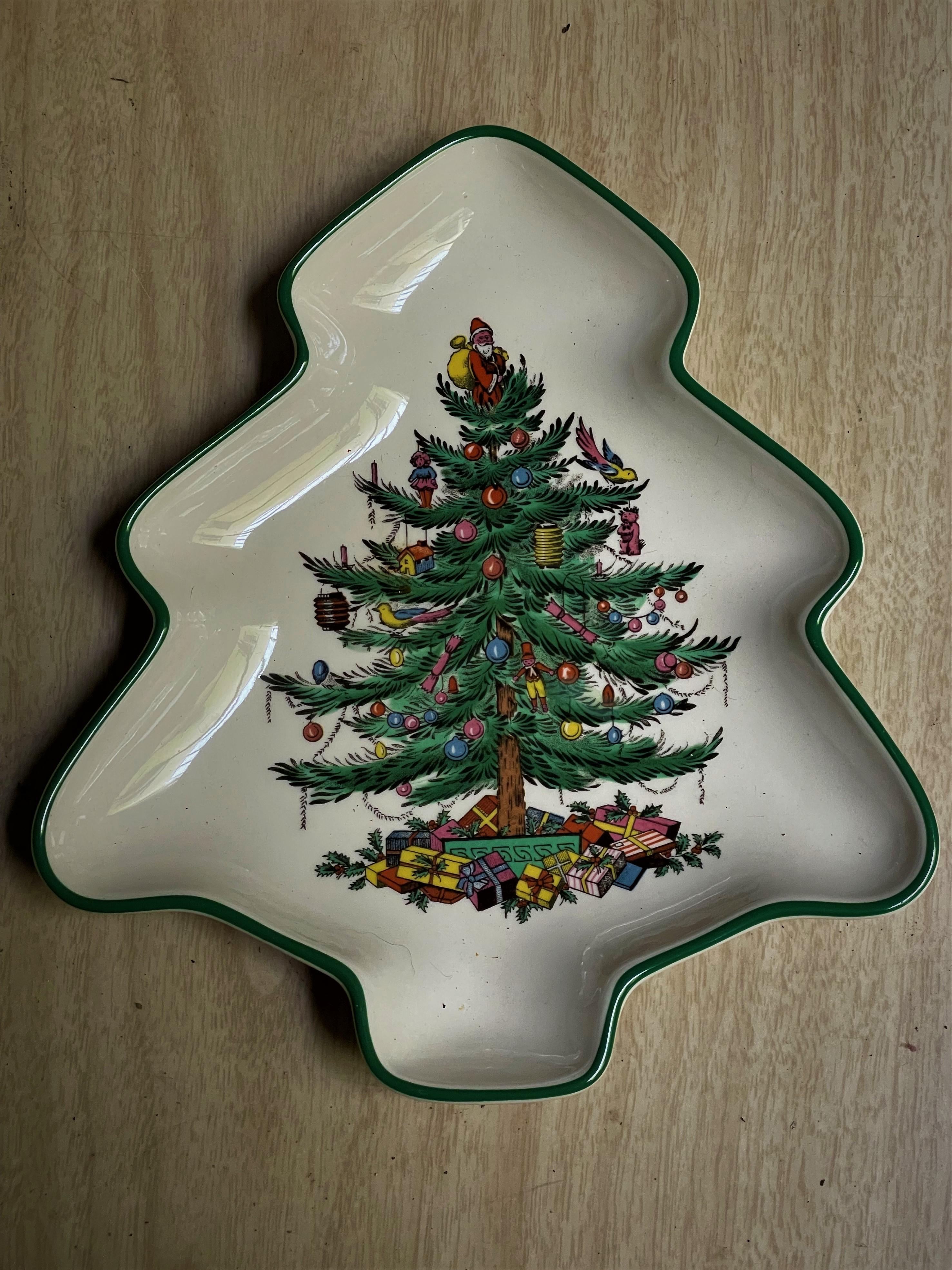 Here are a wonderfully festive pair of Spode porcelain in the Christmas Tree pattern, one is a round plate and the other a low bowl in the shape of a Christmas tree. This pattern was introduced in 1938 and became one the Spode's most popular. The