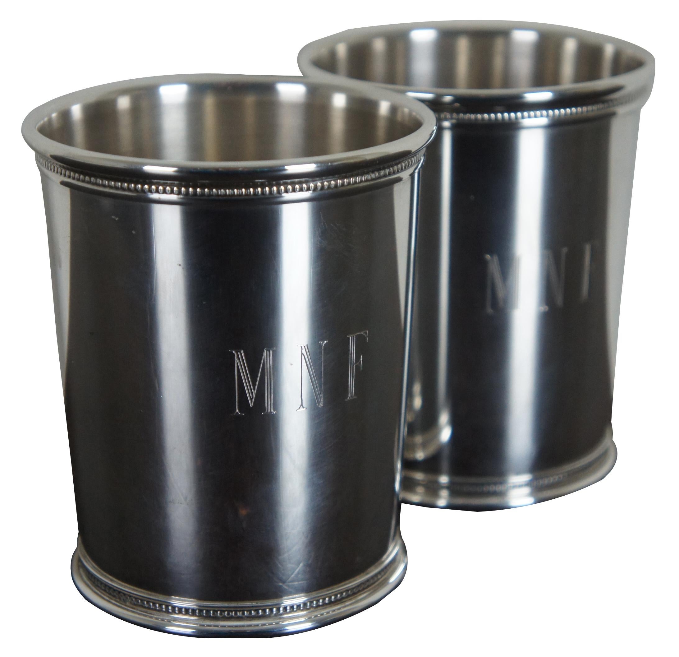 2 Sterling silver bill clinton presidential mint Julep cups Reed Barton WJC x253

2 Sterling silver .925 10 ounce mint julip / derby cup. Marked WJC (William Jefferson Clinton AKA BIll) - 42th President) Reed & Barton, x253. Sterling. Both