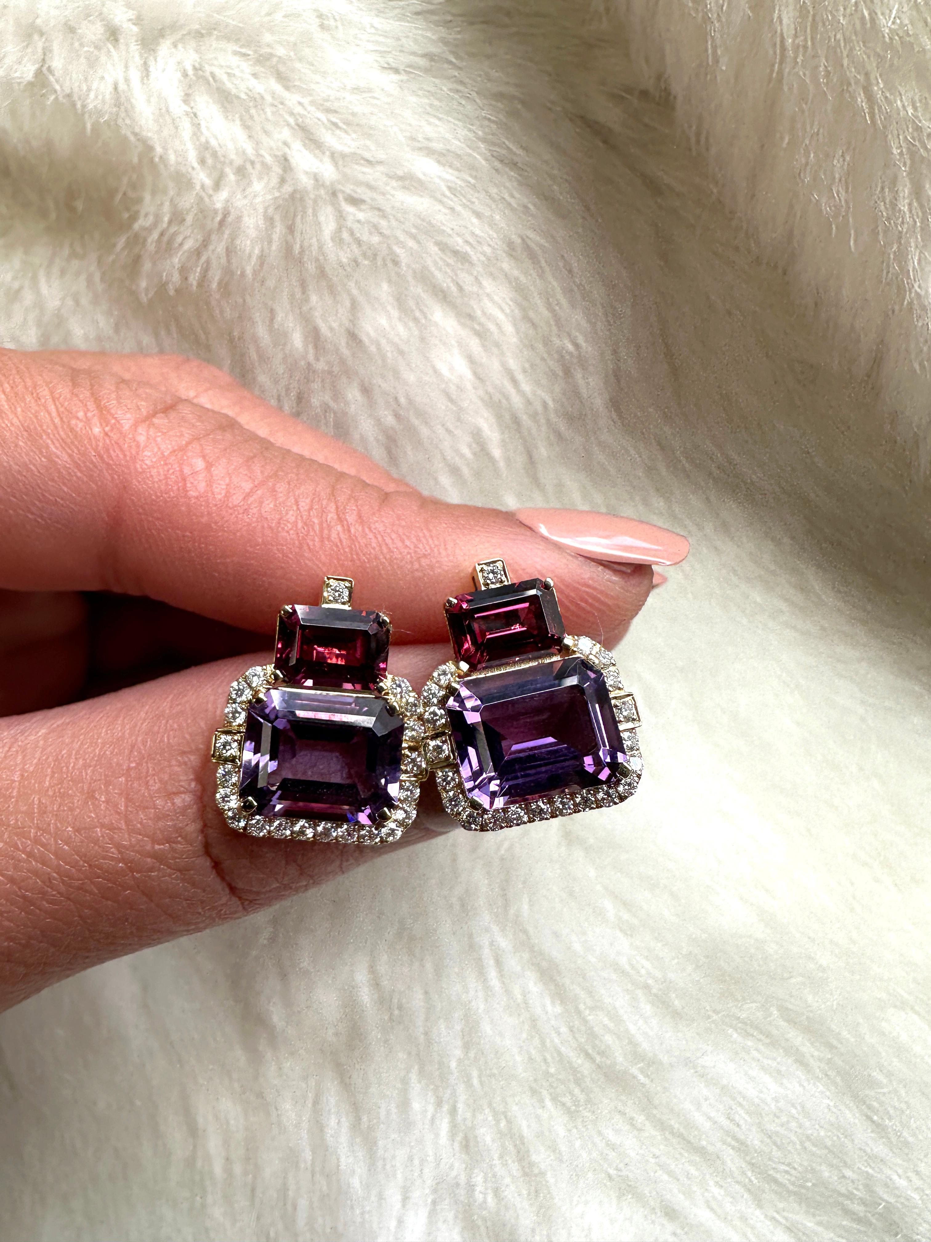 Introducing the captivating 2 Stone Amethyst and Garnet Emerald Cut Earrings with Diamonds in 18K Yellow Gold, a remarkable creation from the exquisite 'Gossip' Collection. Crafted with meticulous attention to detail, these earrings embody elegance