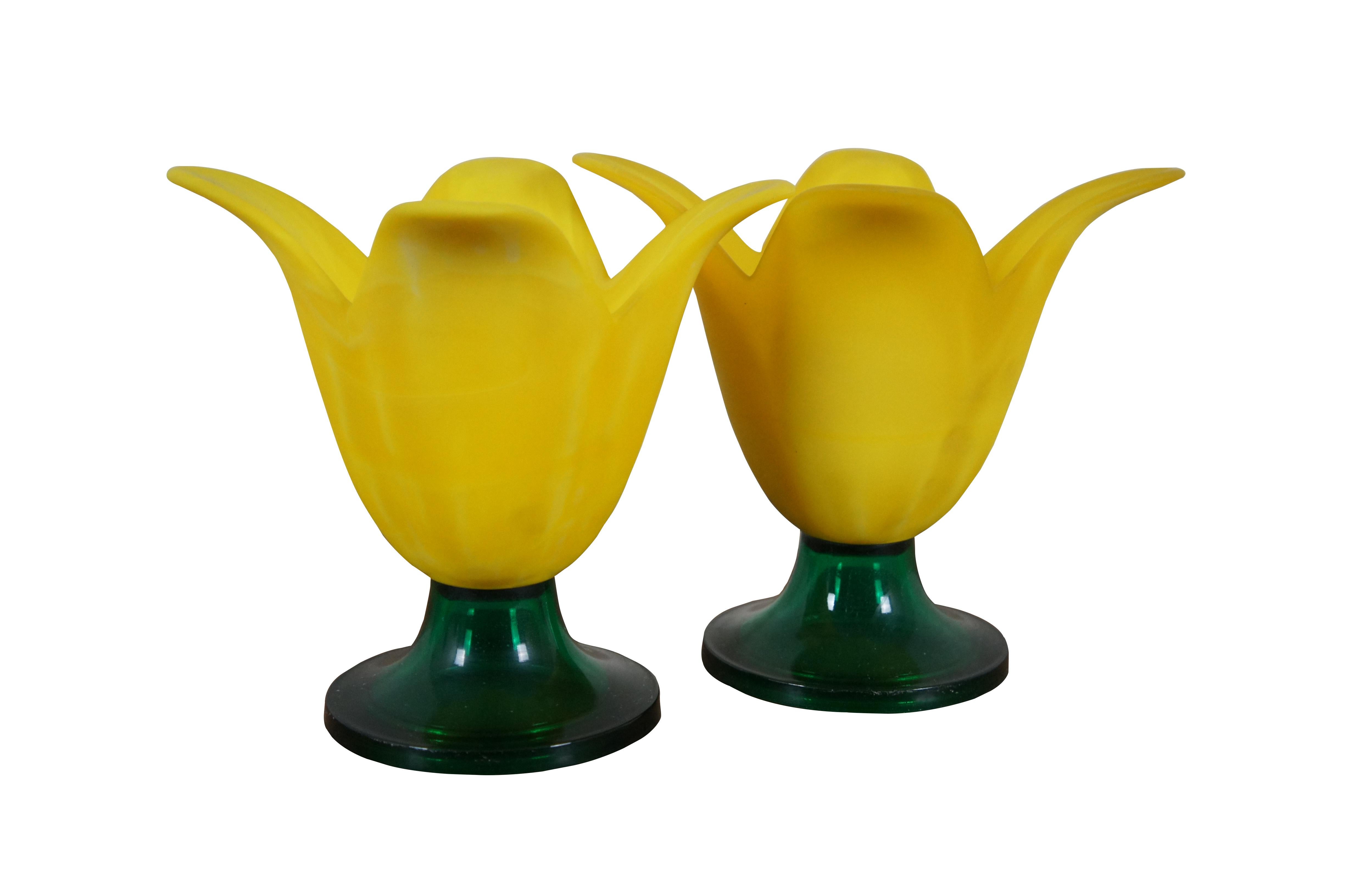 Pair of vintage Studio Nova votive / tea light tulip or daffodil shaped candle holders, featuring round green bases and frosted yellow petal shaped tops.

Dimensions:
7.75
