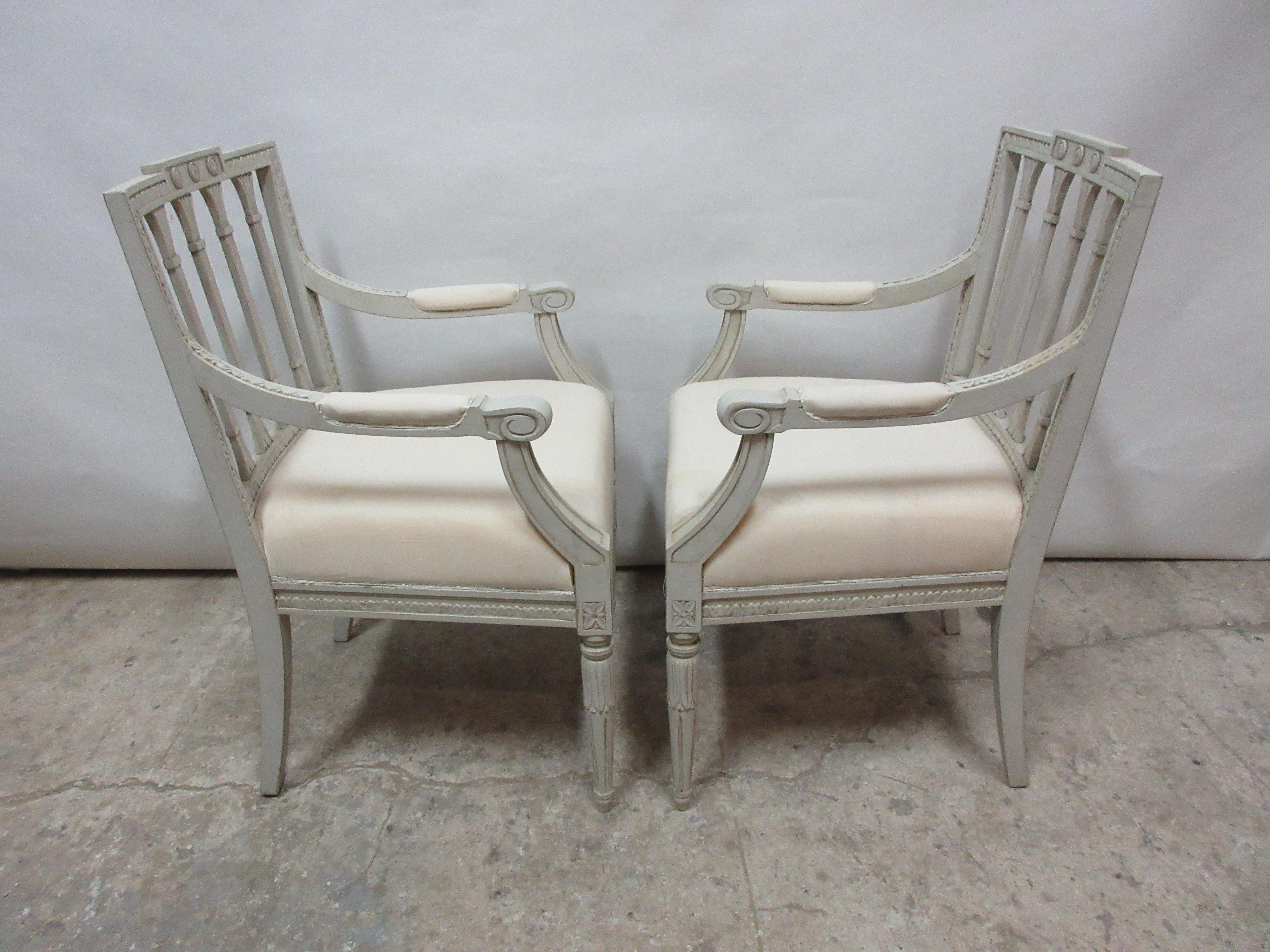 This is a set of 2 Swedish Gustavian armchairs. They have been restored and repainted with milk paints 