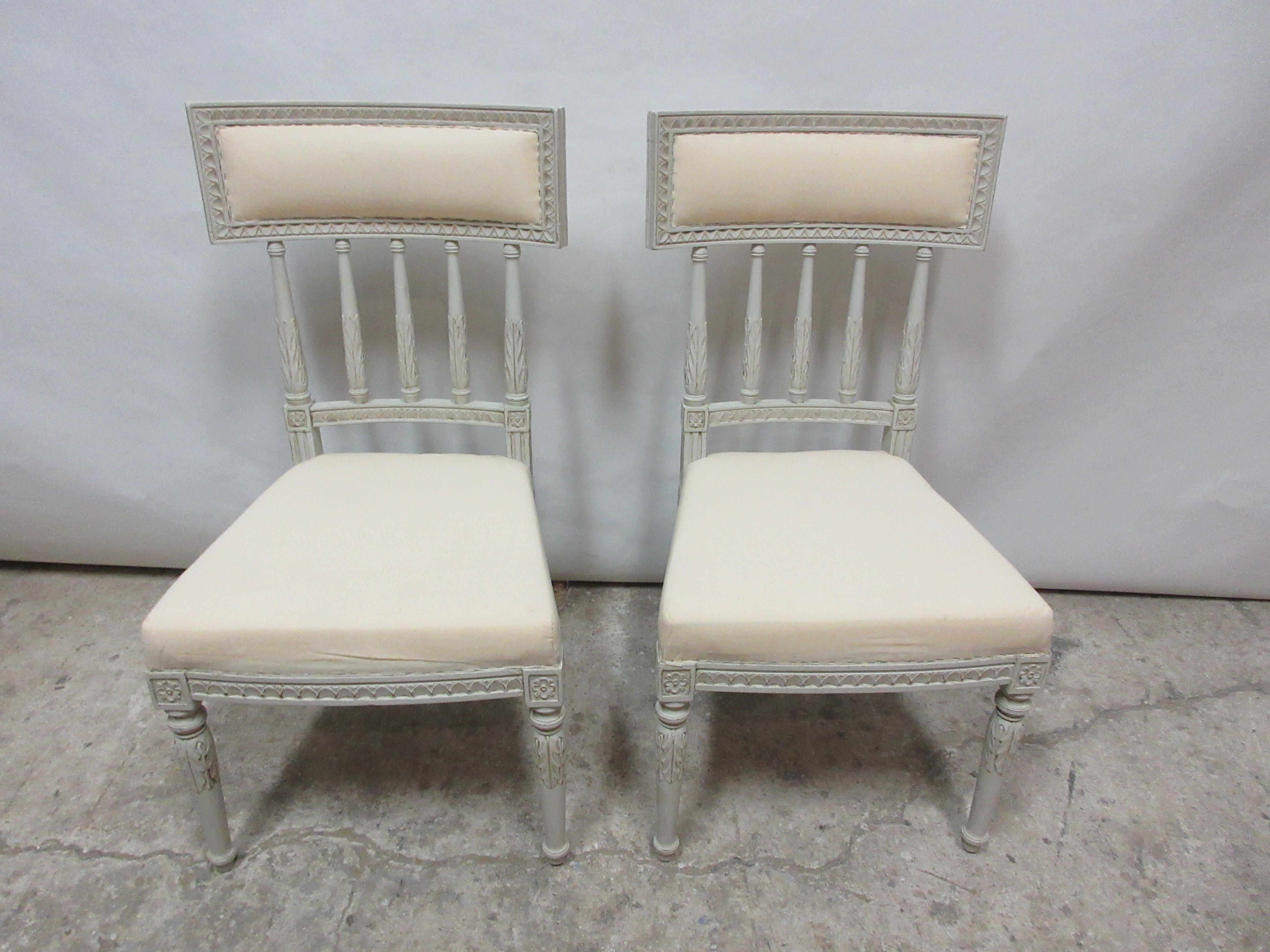 This is a set of 2 Swedish Gustavian side chairs. They have been restored and repainted with milk paints 
