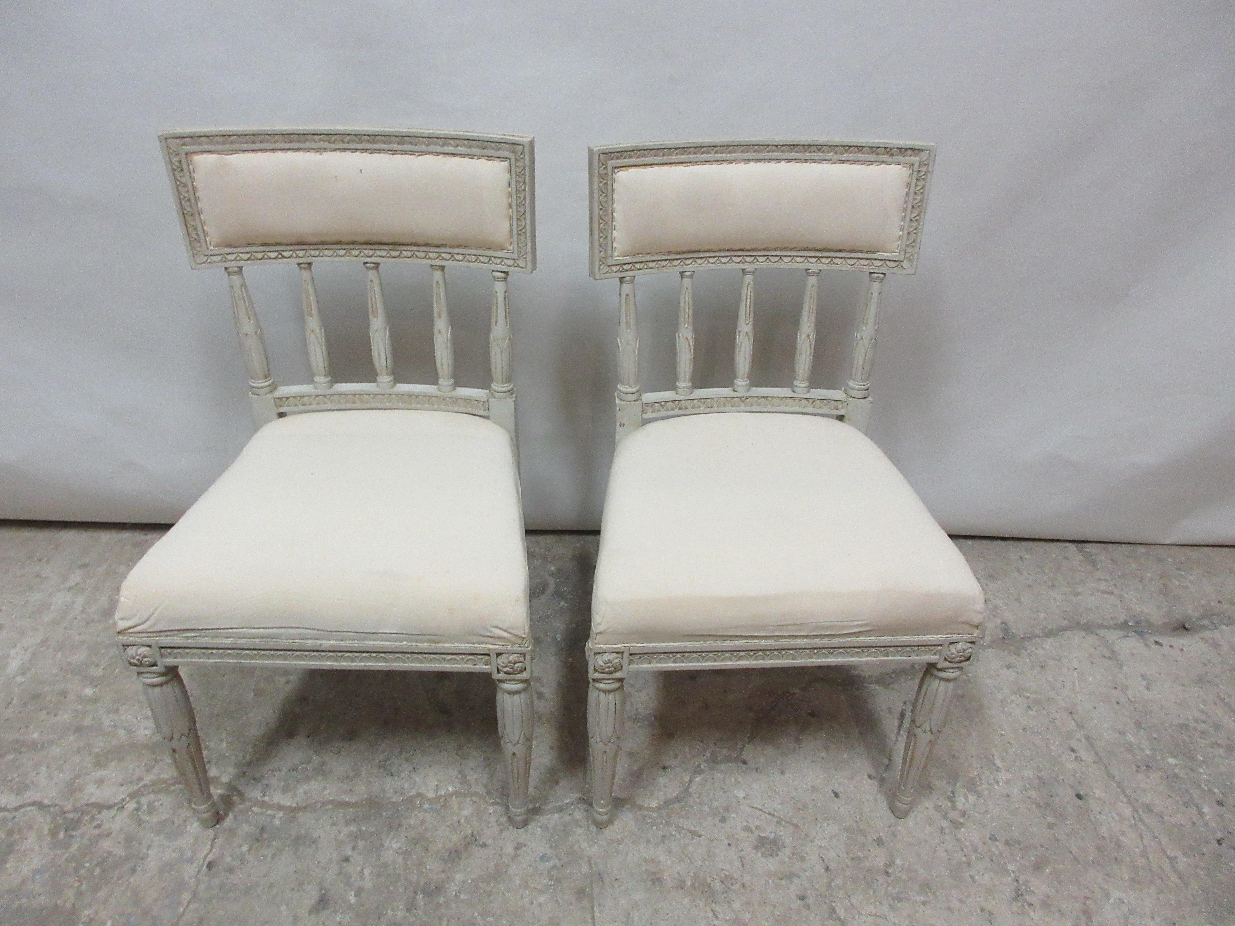 This is a set of 2 Swedish Gustavian side chairs. they have been restored and repainted with milk paints 