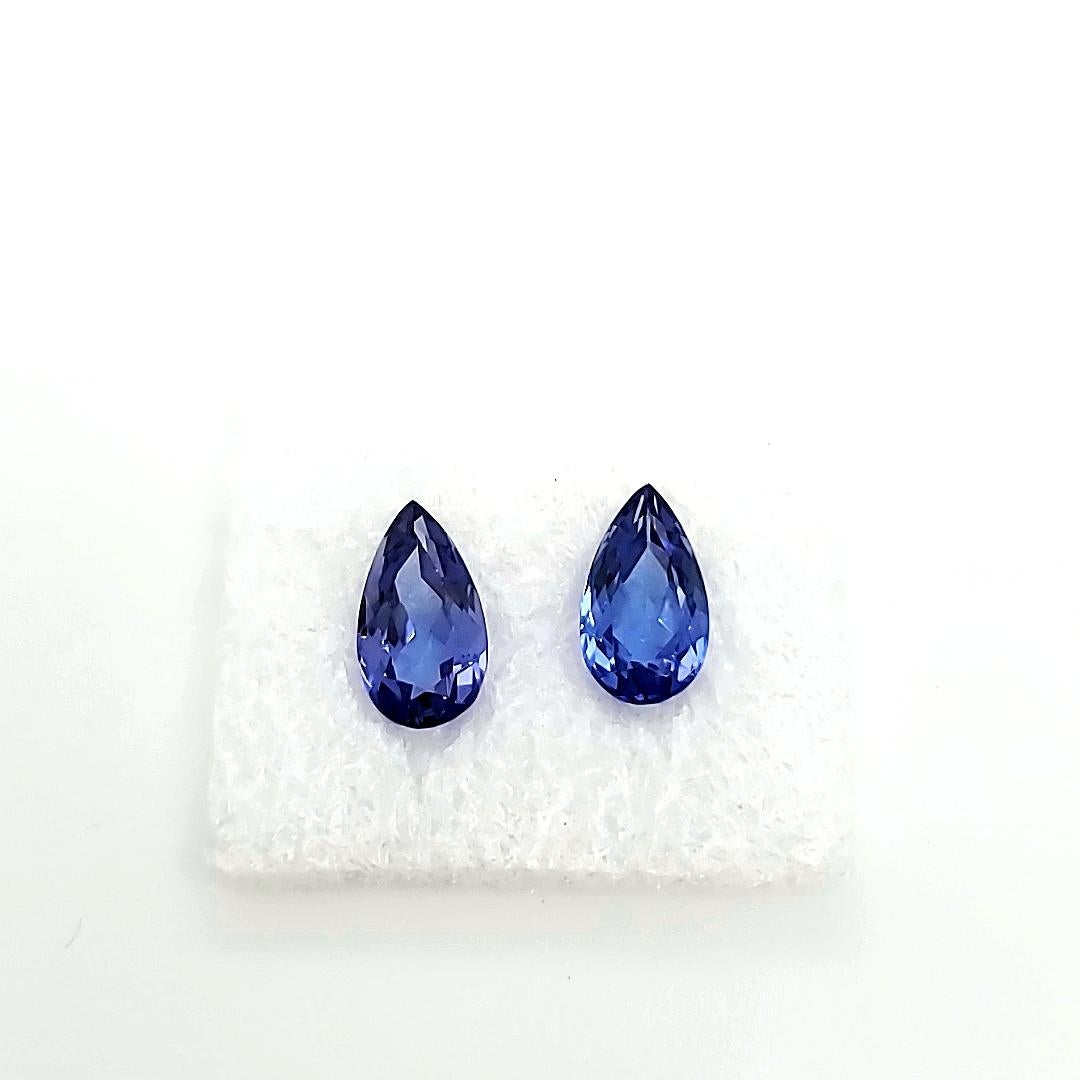 Contemporary 2 Tanzanian Violetish Blue Pear Tanzanites Cts 4.05 With GRS Certificate For Sale