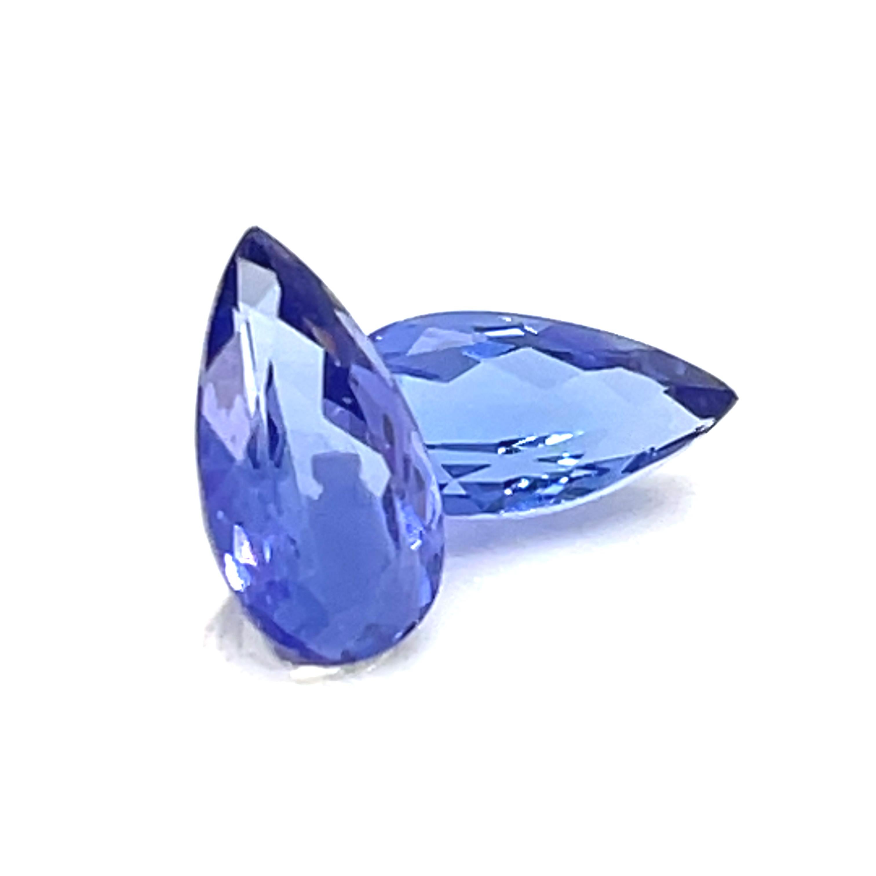 Picture having a piece of Tanzanian beauty that shimmers with the hues of the sky in your palm. 

These two gorgeous violetish blue pear tanzanite stones weigh 4.05 carats. 

They are sourced from Tanzania, a country renowned for its vivid and