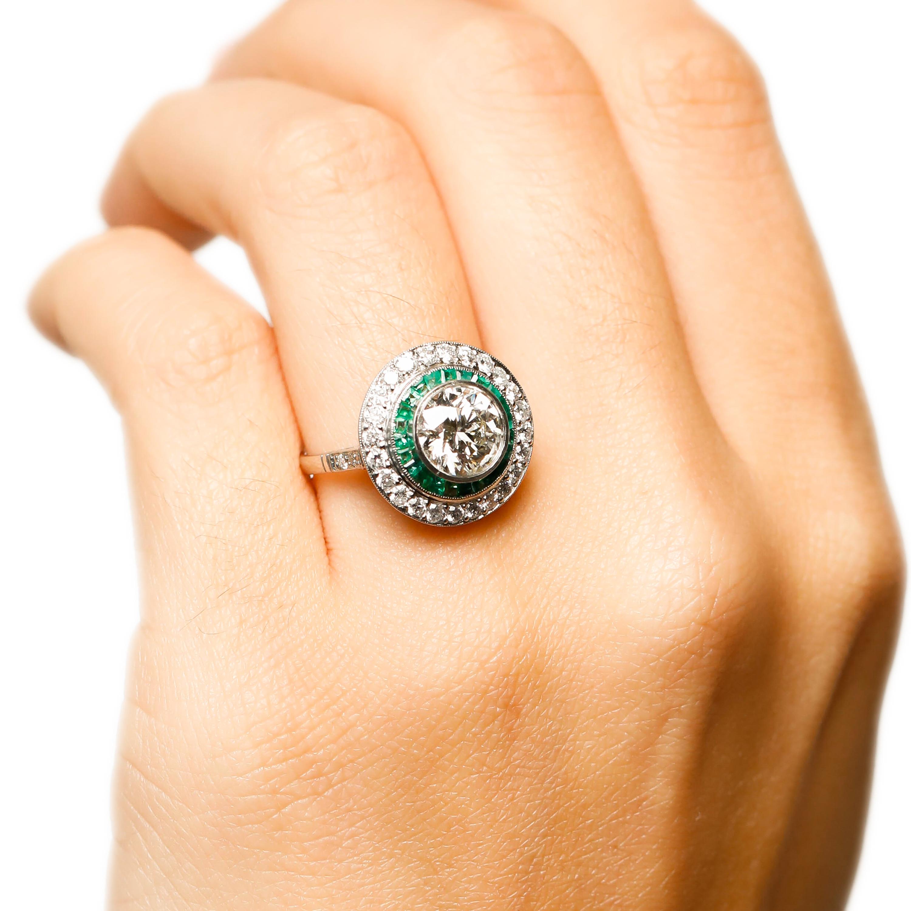 diamond ring with emerald halo