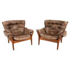 (2) Teak and Leather Danish Lounge Chairs By John Mortensen
