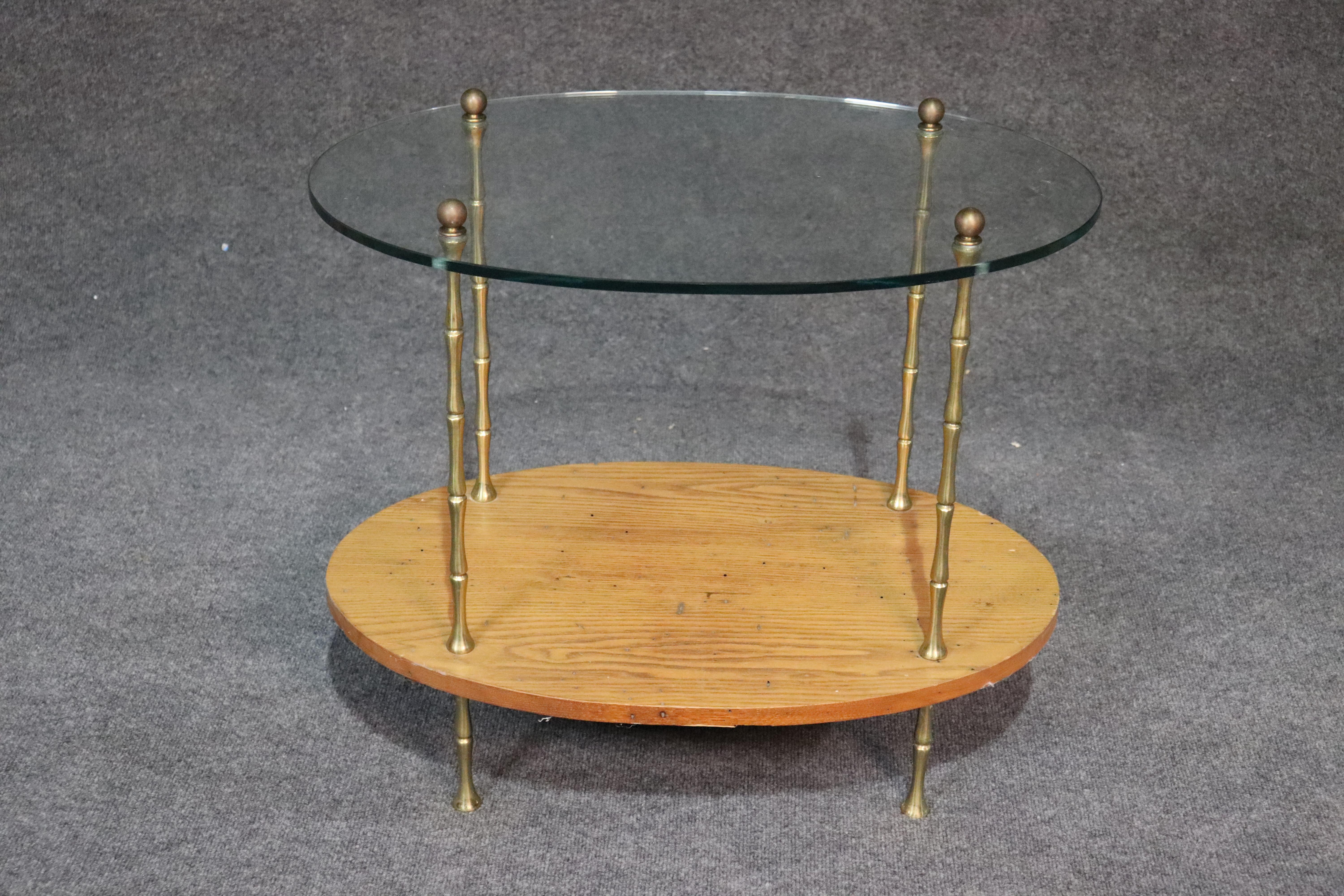 2-tier glass top faux bamboo occasional table with a walnut base, attributed to Maison Baguès.