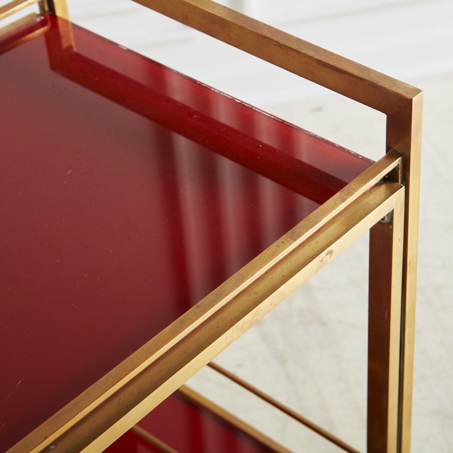 Mid-Century Modern 2-Tier Red Glass + Brass Bar Cart by Guy Lefevre for Maison Jansen, France 1960s