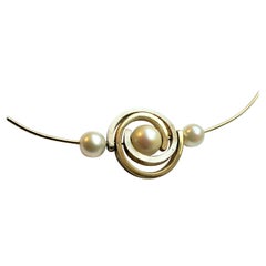 Collier en forme de spirale en or et argent 2 tons avec perles Akoya