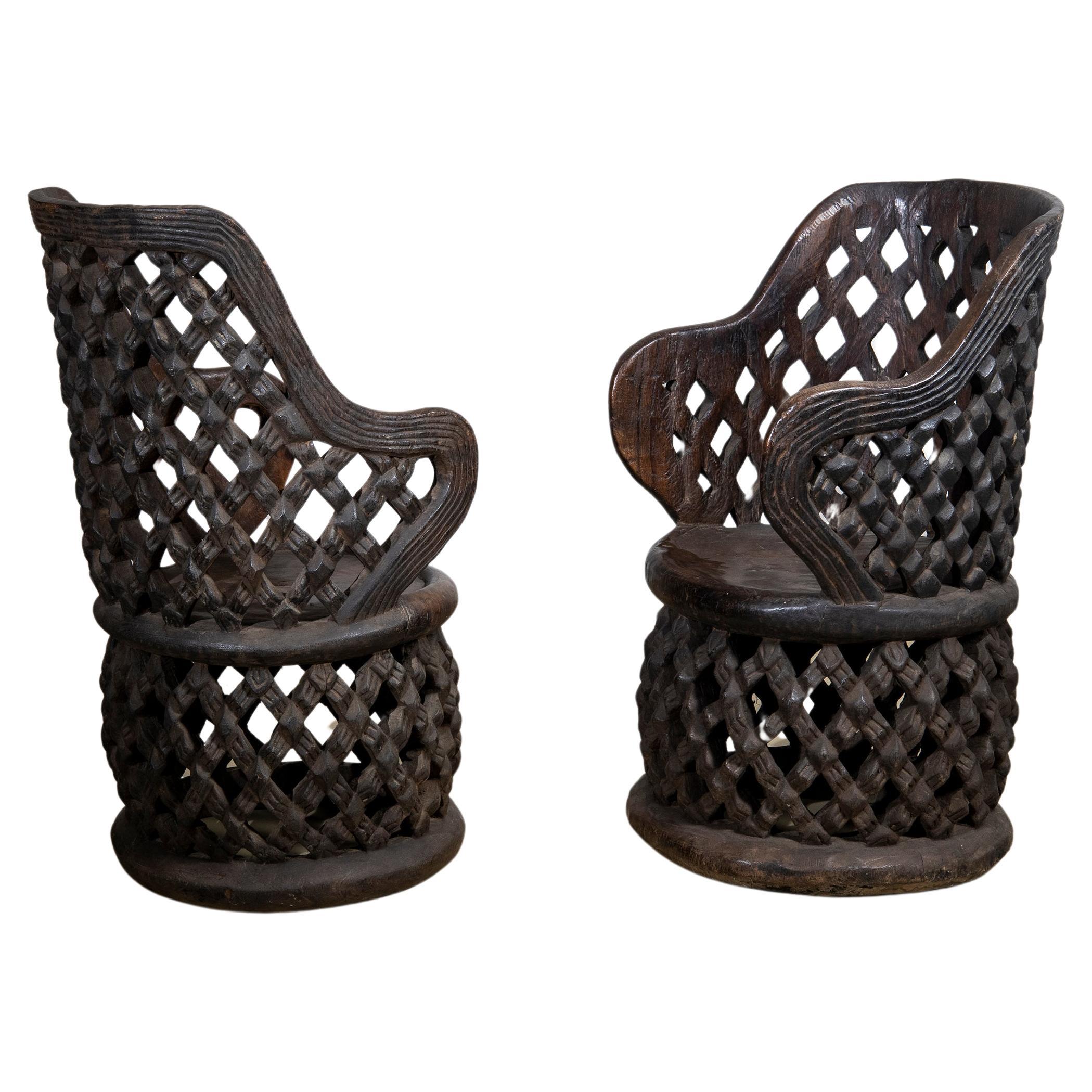 2 African carved thrones, Bamileké