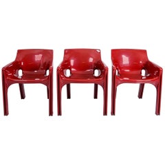 2 Gaudi Armchairs by Vico Magistretti for Artemide in Dark Red