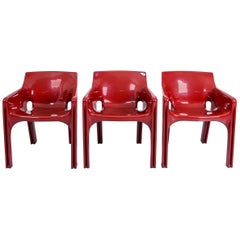 2 Vicario Armchairs by Vico Magistretti for Artemide in Dark Red