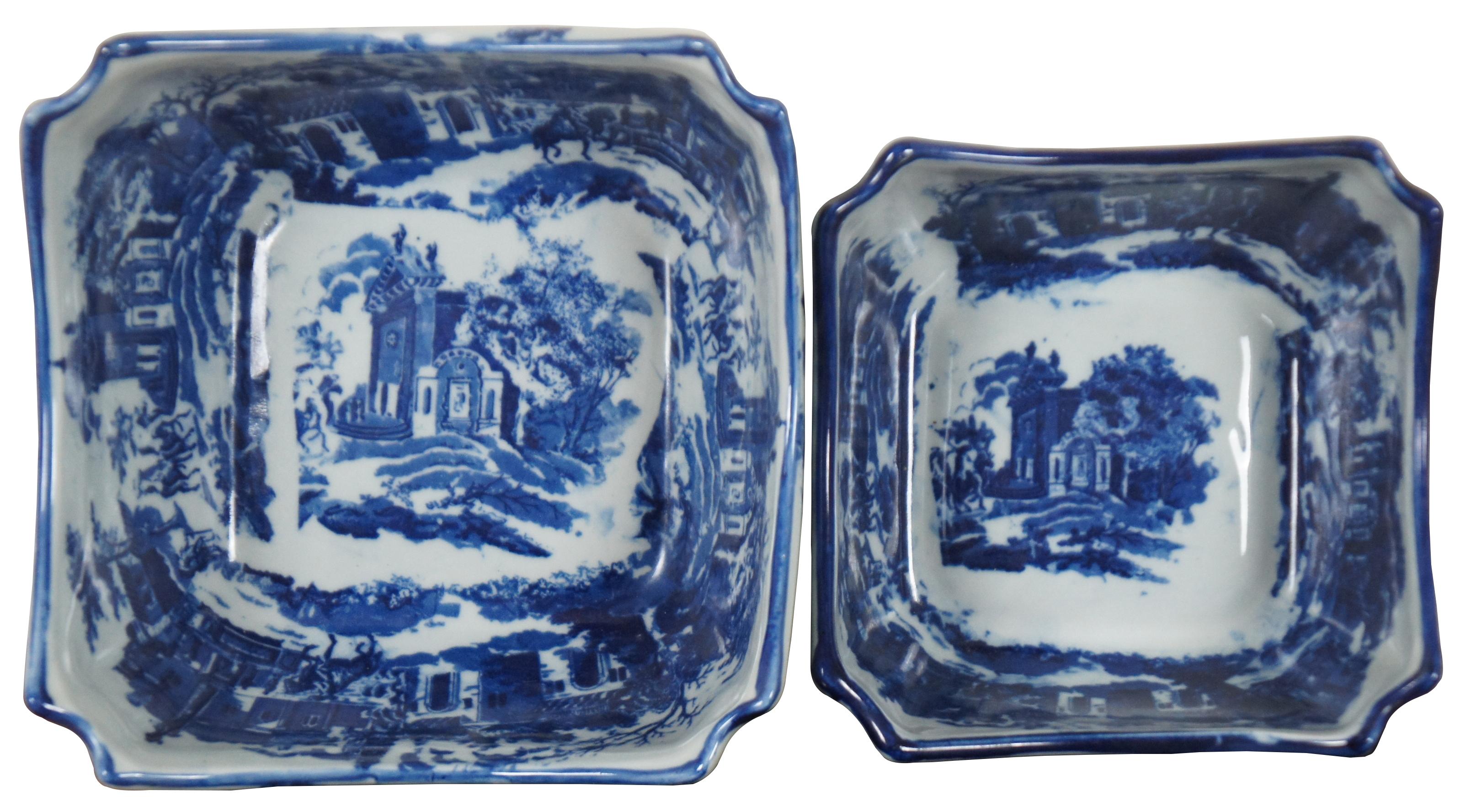 Pair of vintage England Victoria Ware porcelain / ironstone blue and white transferware serving bowls, square with cut corners, featuring a Canton or Chinese export style pattern showing a English / European town scene with figures on