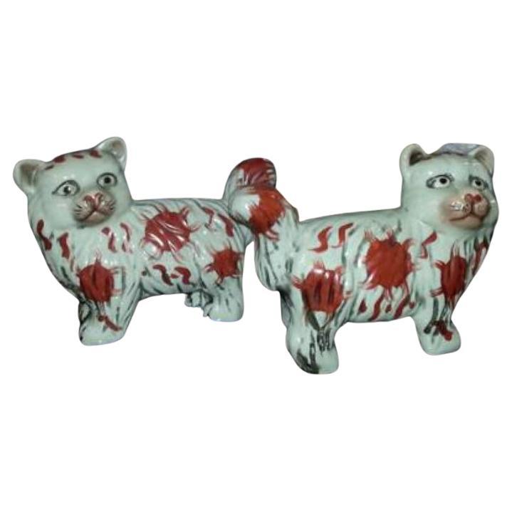 2 Victorian Staffordshire Matching Ceramic Cats On Gold Trim Navy Blue Pillows For Sale