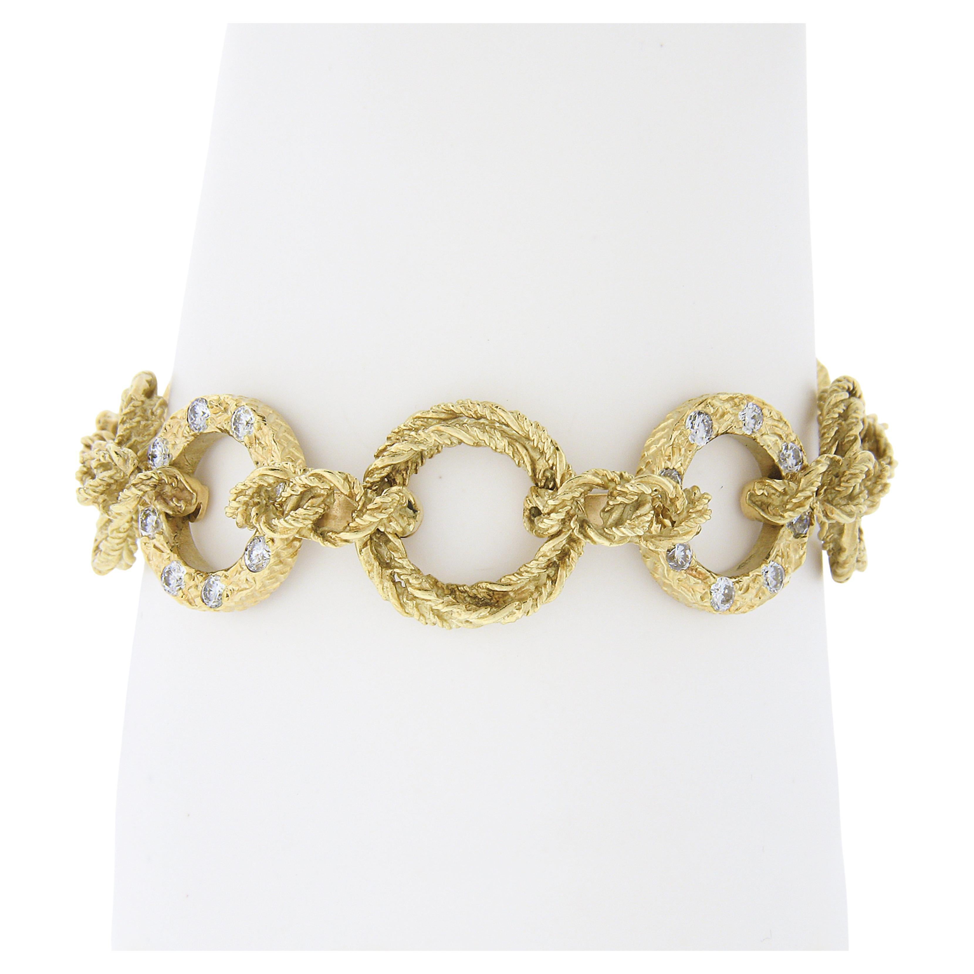 This beautiful vintage statement bracelet set was crafted from solid 18k yellow gold. These very well made bracelets feature interlocking, textured, twisted wire links throughout with a wonderful polished finish for a super attractive look. One of