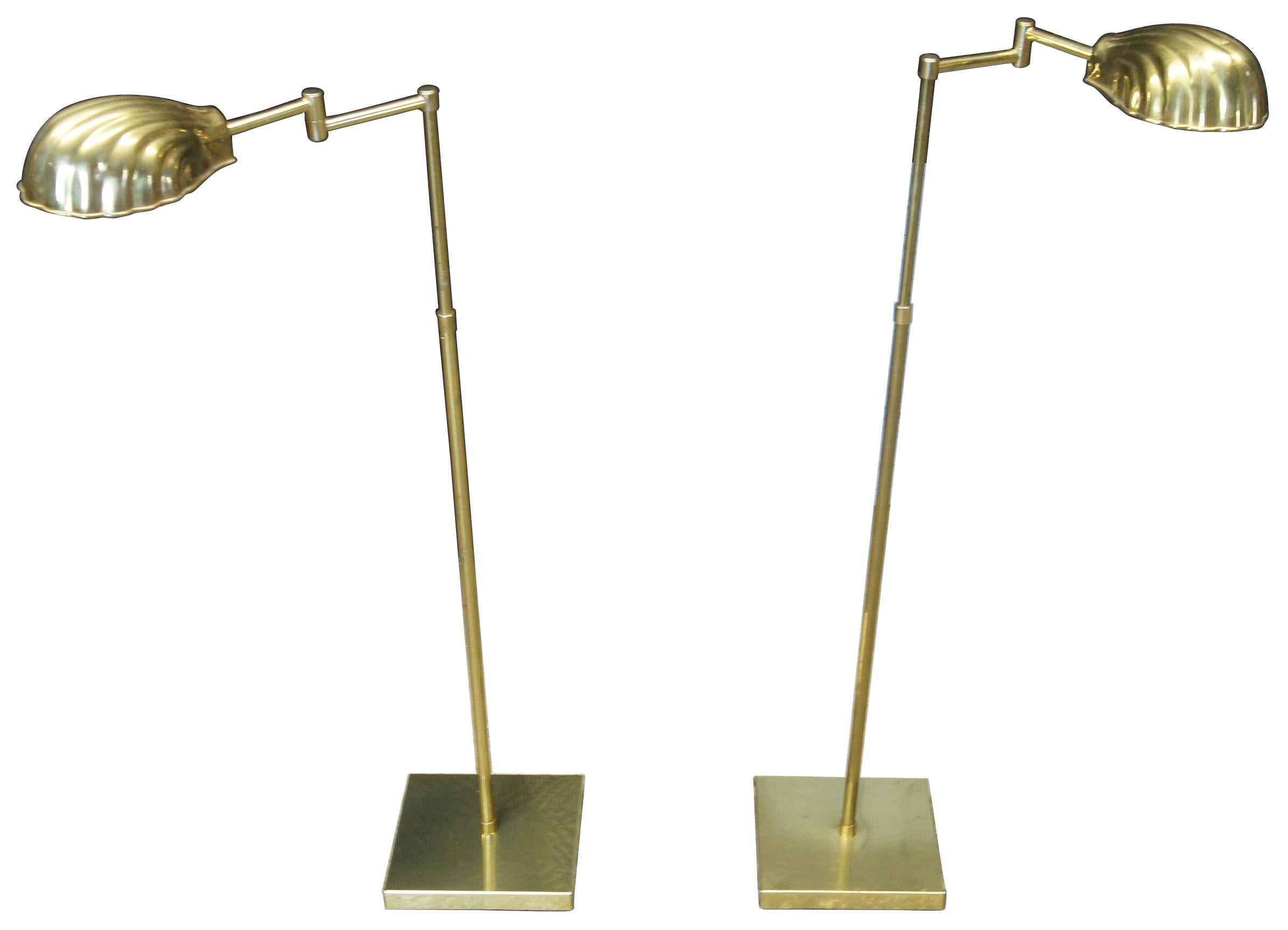 Pair of two mid century Alsy Mfg adjustable swing arm floor lamps. Made of brass featuring clam or scallop shell shade

Measures: 8.5