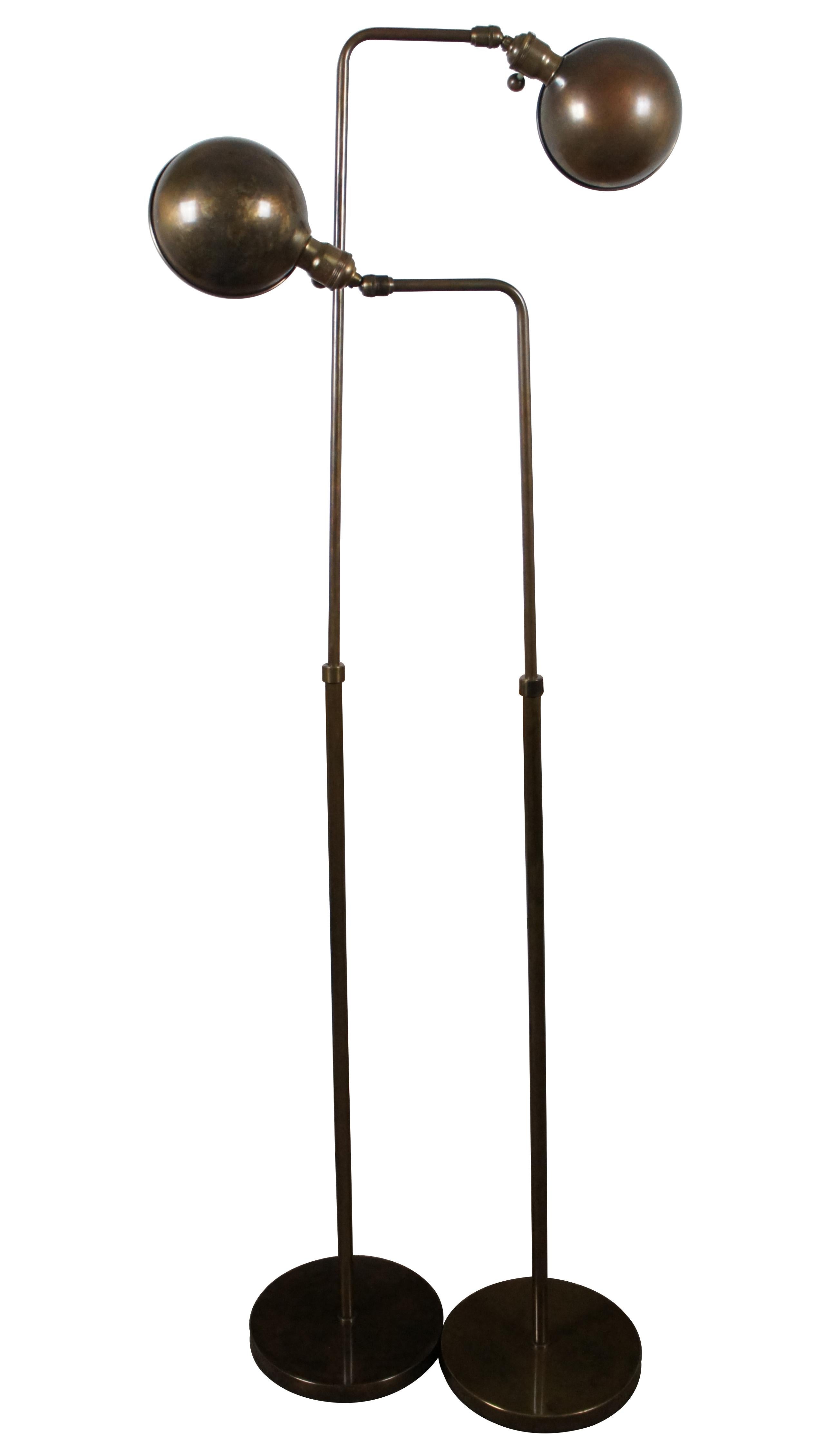 Pair of vintage Bryant mid century brass pharmacy style reading / floor lamps with adjustable height and three way switch.

20” x 9.75” x 40” / Height Adjustable Up To – 65” (Width x Depth x Height)