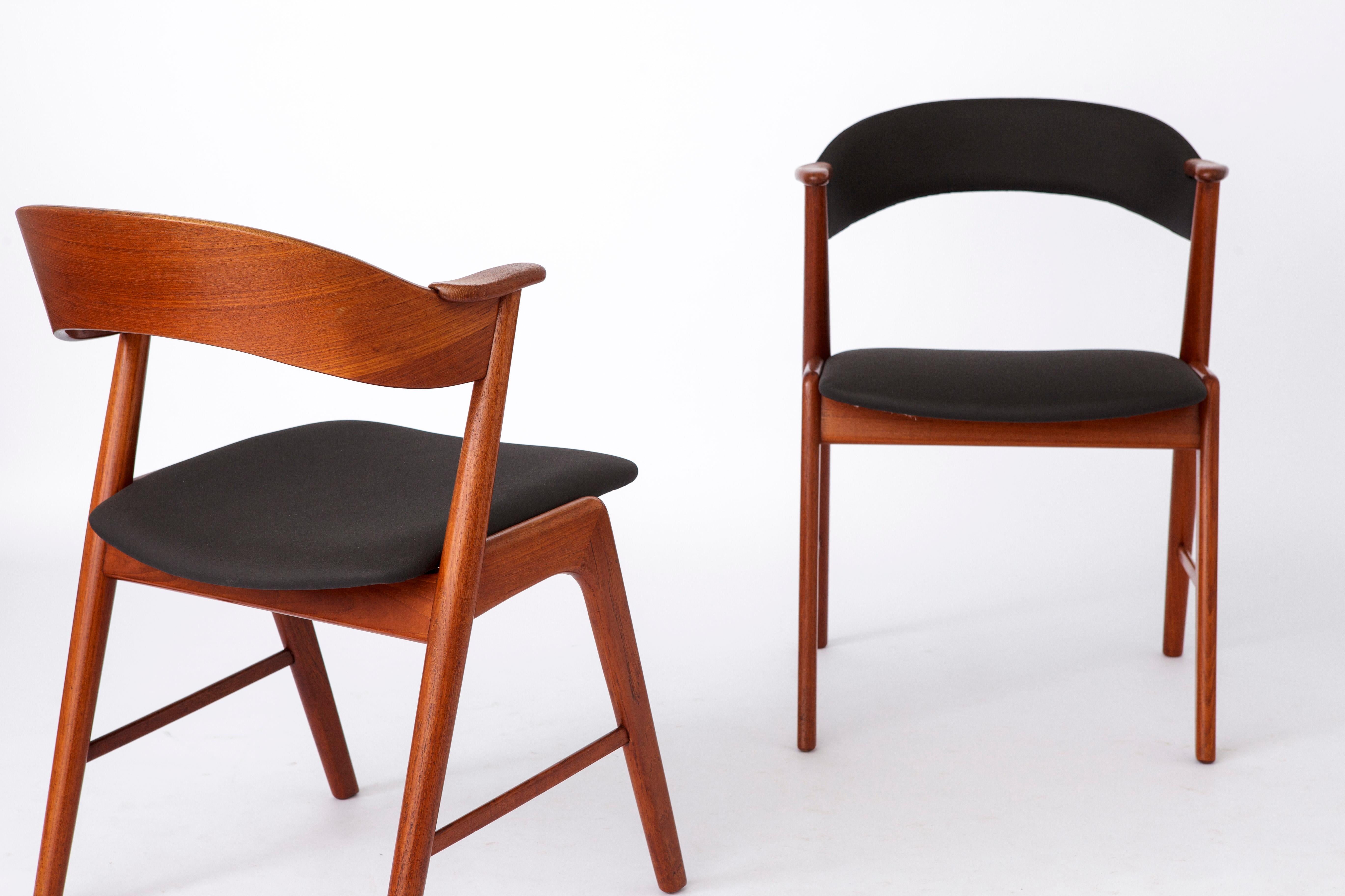2 Vintage teak chairs designed presumably by Henry Kjaernulf for 
manufacturer Korup Stolefabrik, Denmark in the 1960s. 
Ideal as desk or dining chair!
Displayed price is for 2 chairs. 

Sturdy teak chair frame. Refurbished and oiled. 
The seats