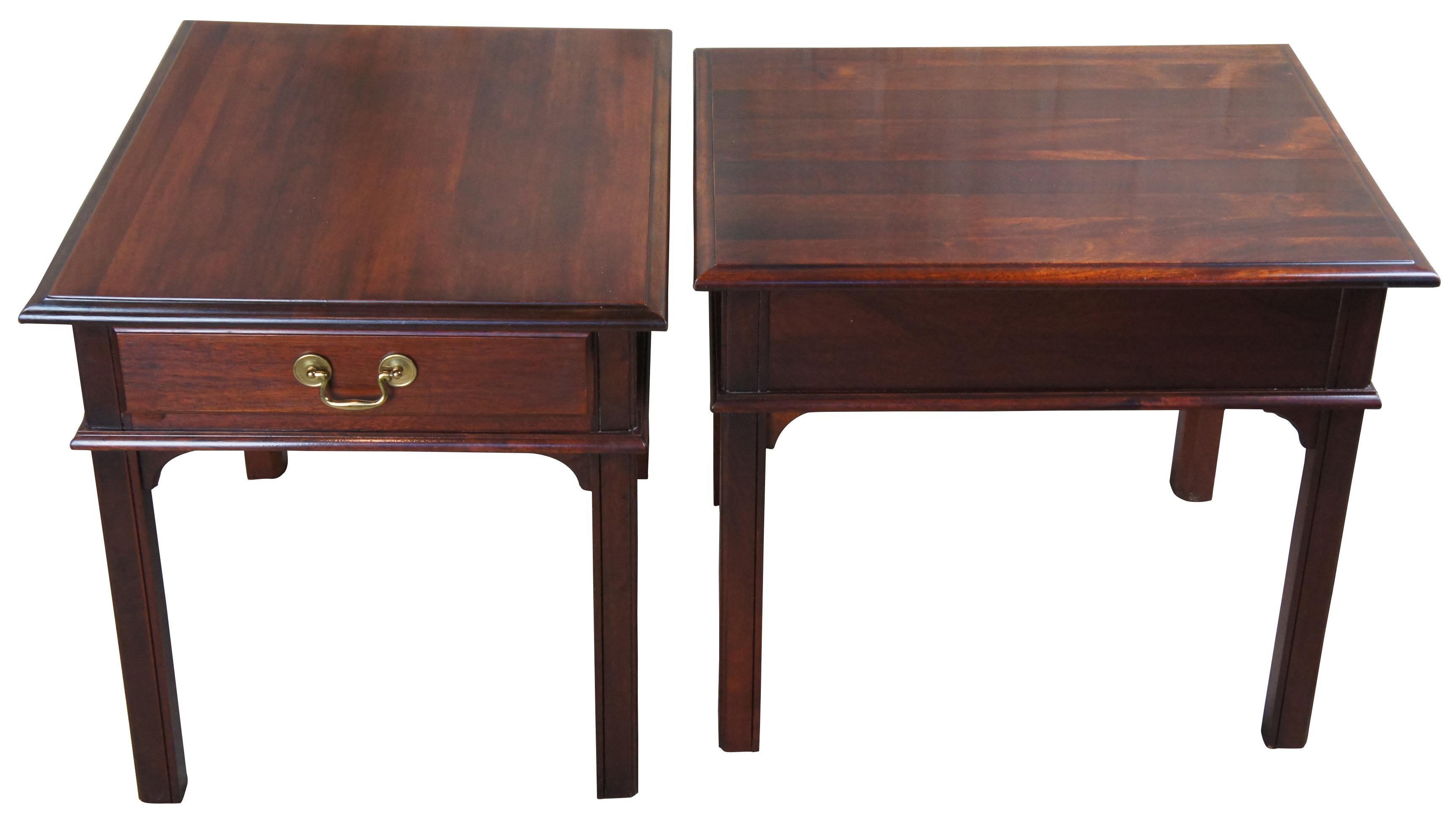 Two circa 1980s Chippendale style side tables. Made from mahogany with dovetailed drawer and bail hardware.
  