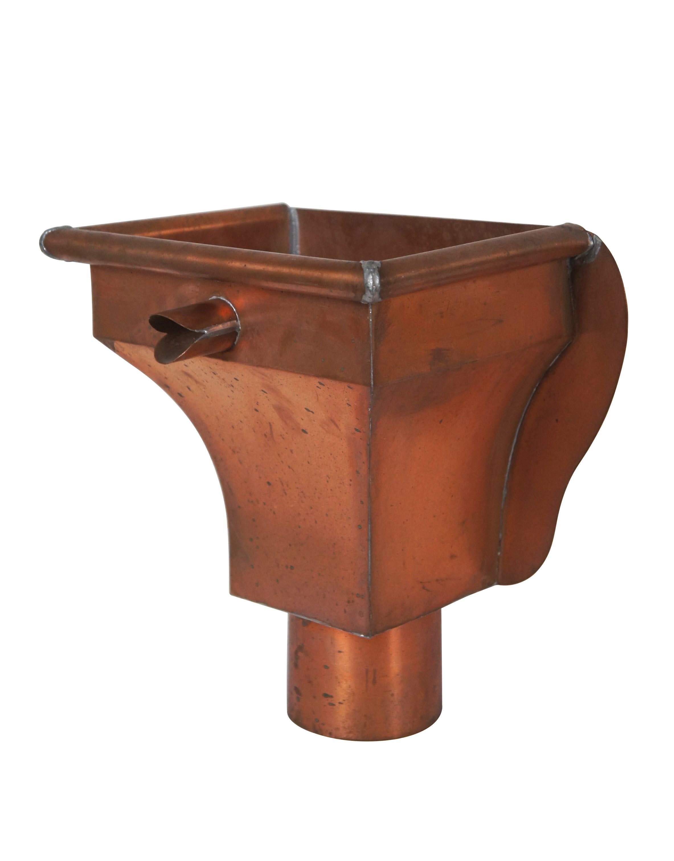 Pair of late 20th century copper gutter leader heads / leader boxes / hoppers with overflow pipe. Italian / Old Dutch styling with bird's beak shaped overflow spouts. Base Diameter 4