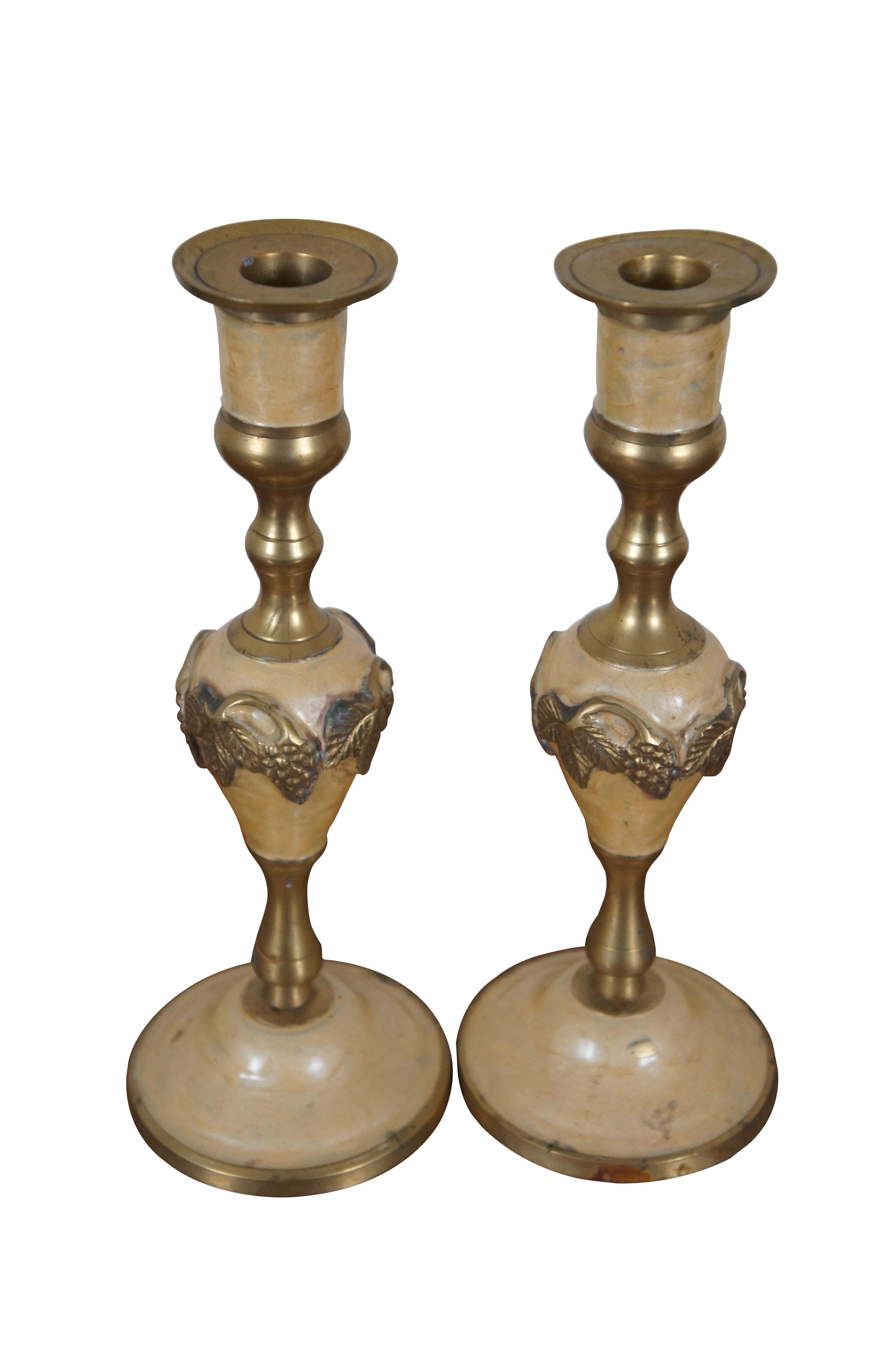 Two vintage enameled brass candlesticks or candle holders featuring a grape and leaves motif.

Dimensions:
3.75