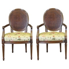 2 Vintage French Louis XVI Caned Walnut Open Arm Oval Balloon Back Arm Chairs