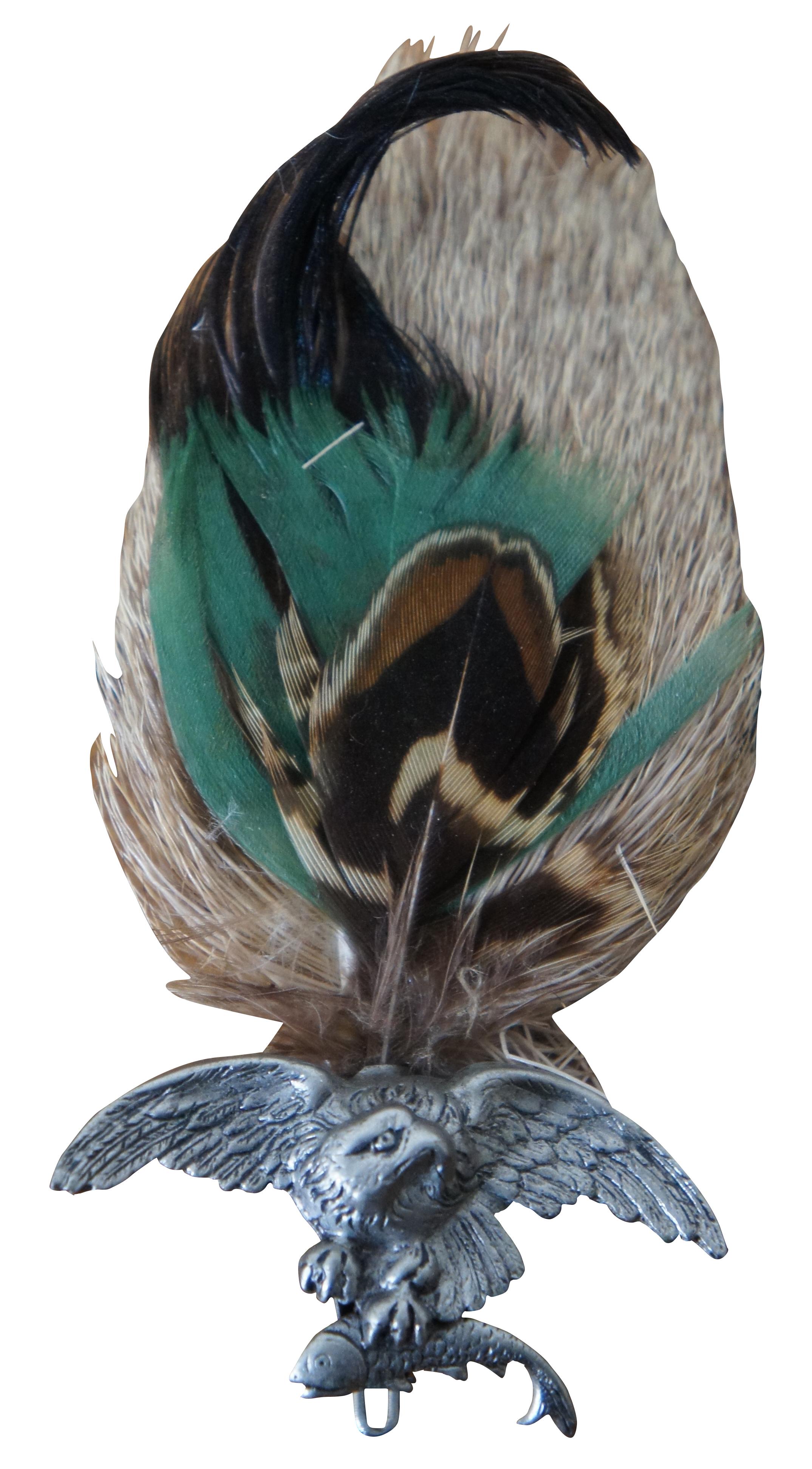 Pair of two rare mid century German / Austrian hat pins decorated with fur and feathers, one showing and eagle with a fish in its talons and the other a pheasant or grouse on a branch. Traditionally worn on alpine climbing or hunter's hats and often