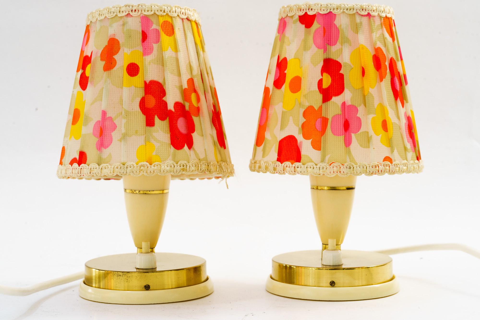 2 vintage lucite table lamps with original fabric shades vienna around 1960s
Original condition
Original fabric shades